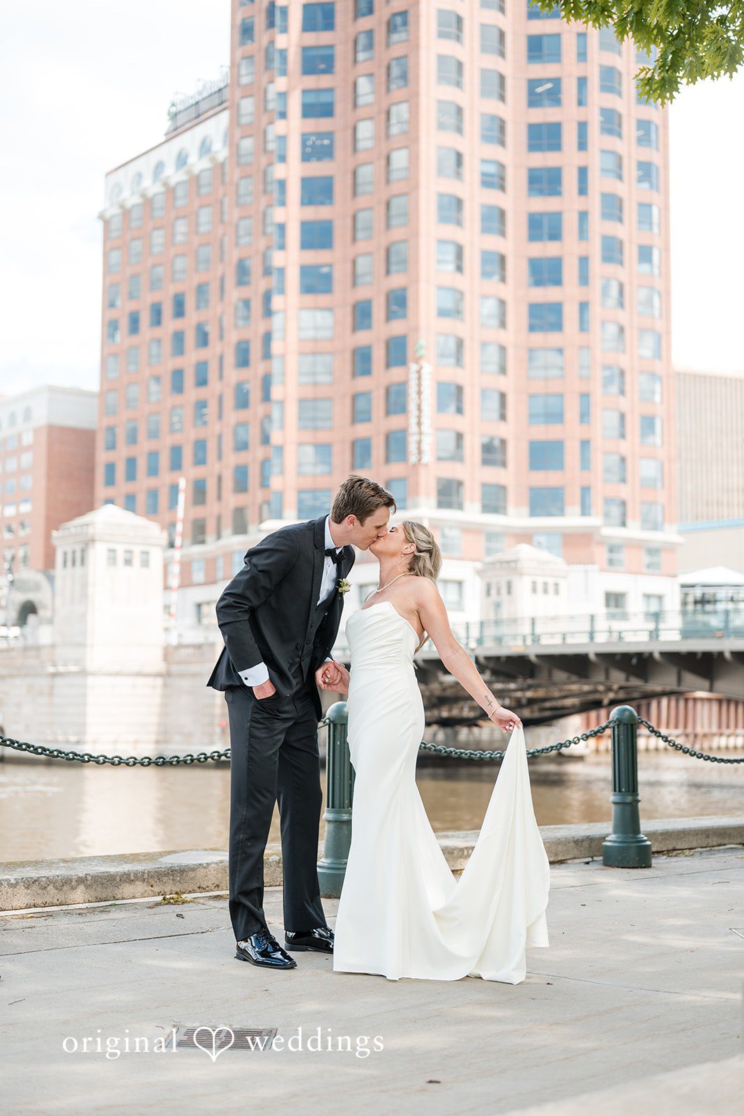 Romantic kiss moment of couple with beautiful backdrop