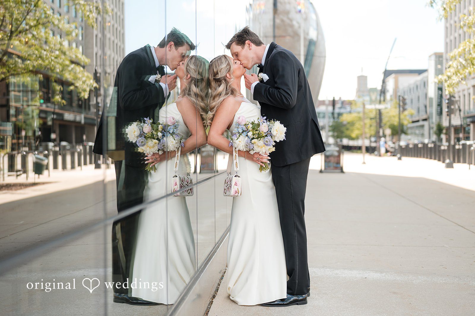 Lovely couple sharing a romantic kiss at Gather at Deer District