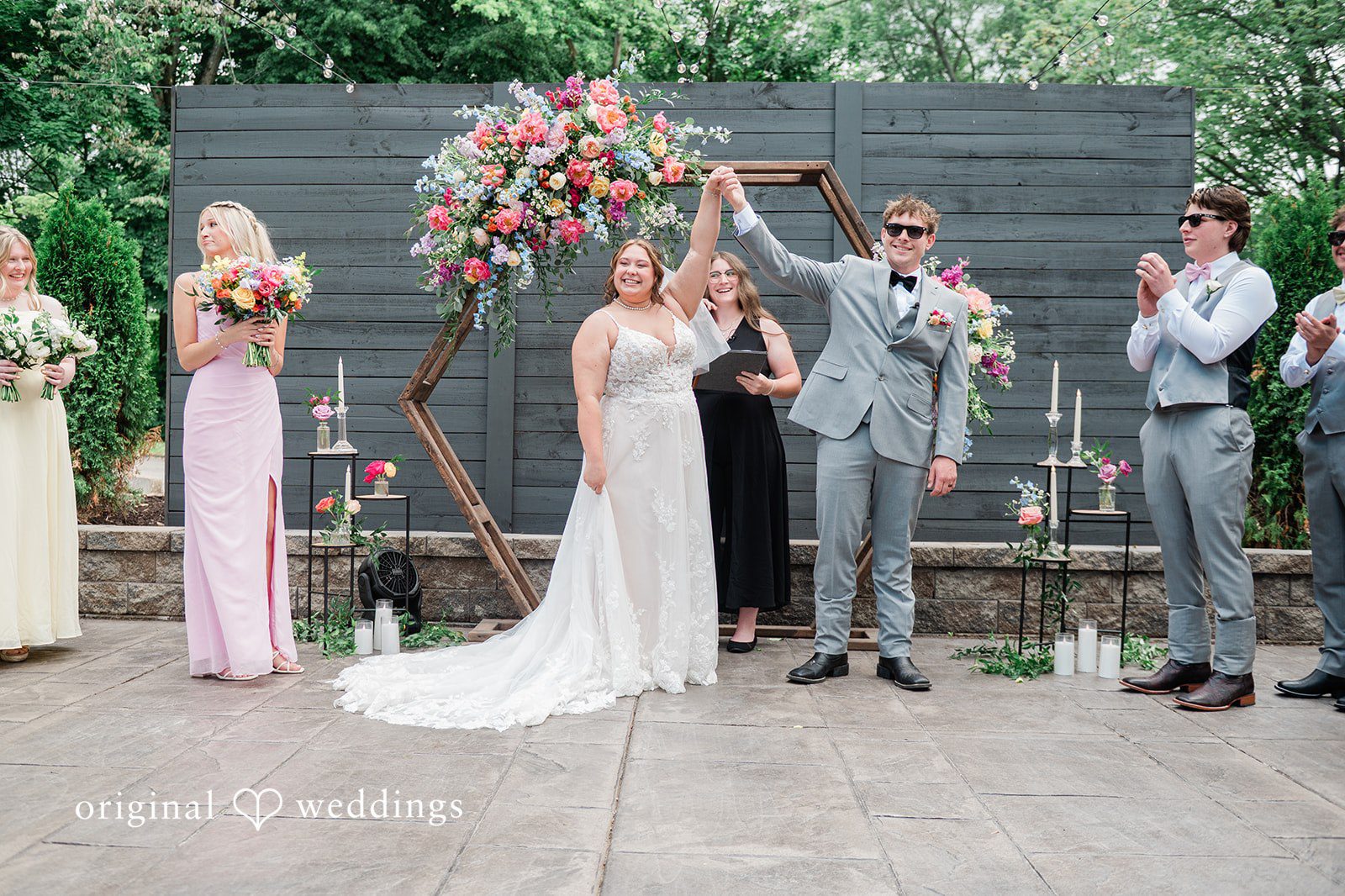 Janissa + Josh Bride and groom showcasing their joy after the ceremony