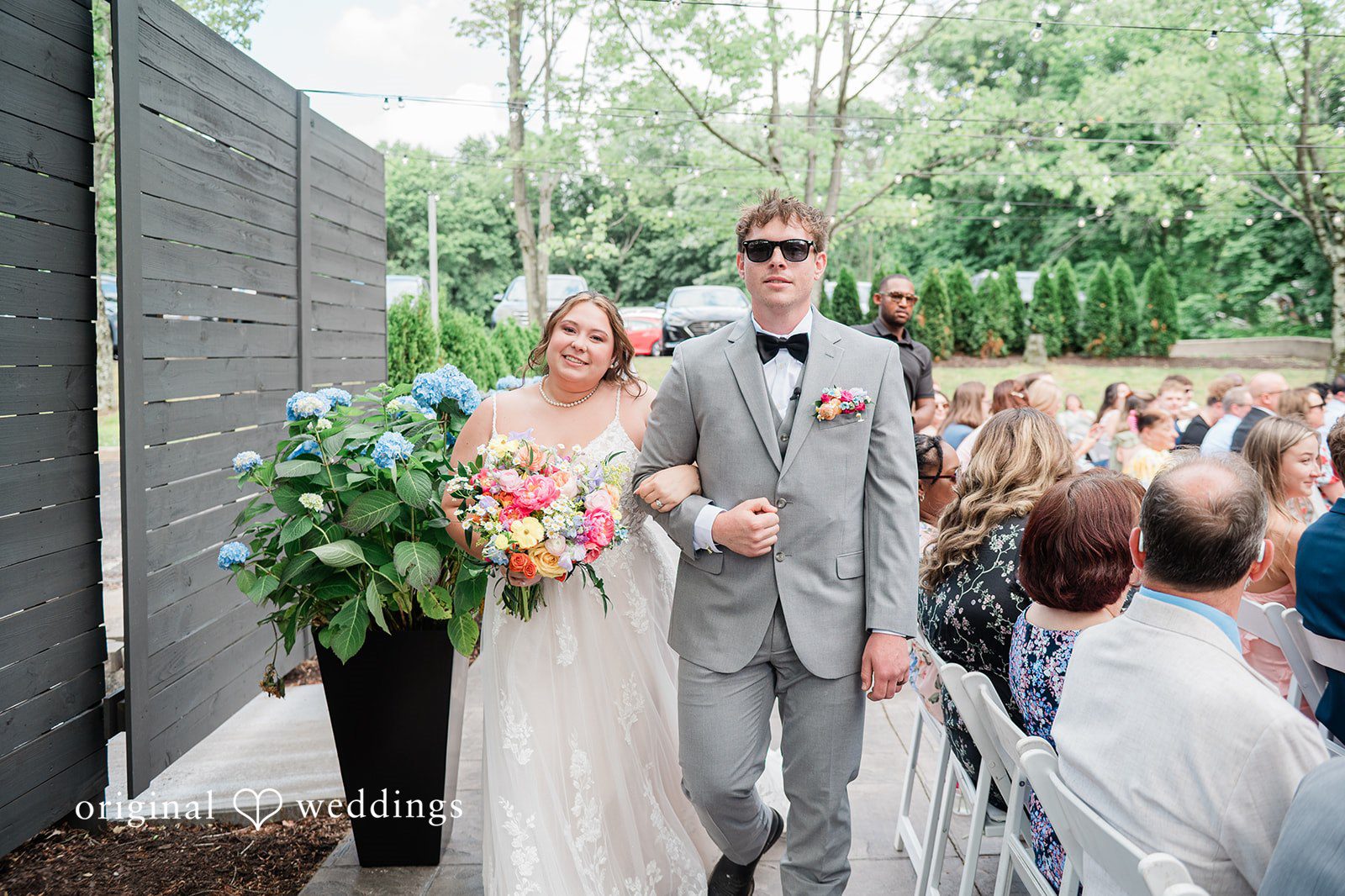 Janissa + Josh Beautiful couple leaving the altar after the ceremony