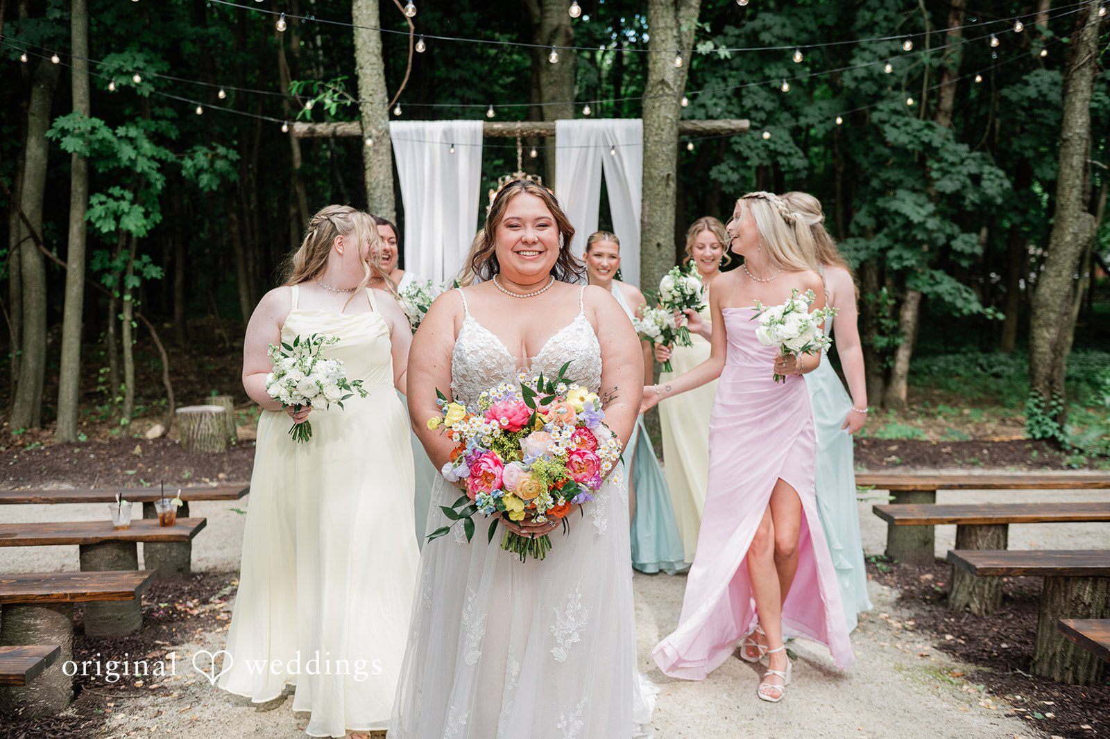 Janissa + Josh Group picture of bride with the bridesmaids at Gather at the Lakes