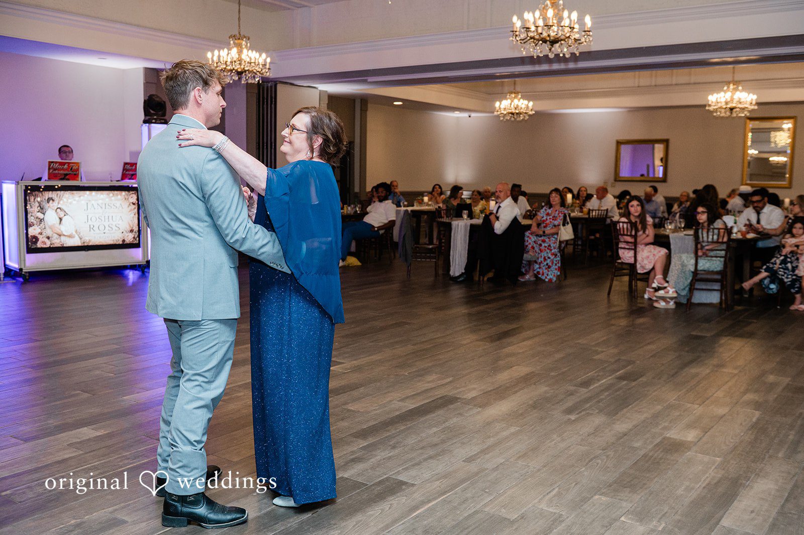 Janissa + Josh Groom sharing dance with a women in blue gown