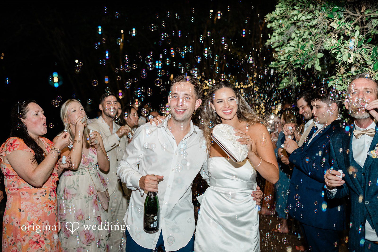 The guests blow bubbles out of excitement