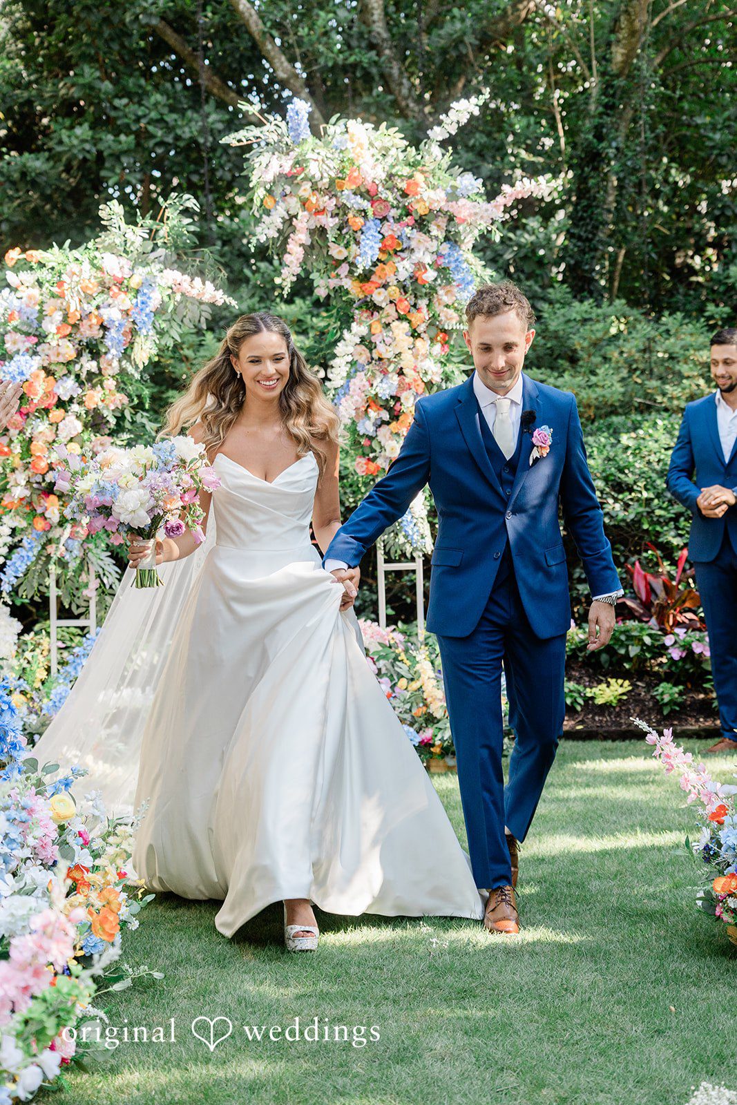 The couple makes a joyful exit