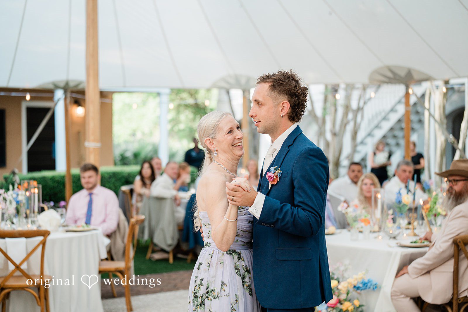 The groom dances with his mother