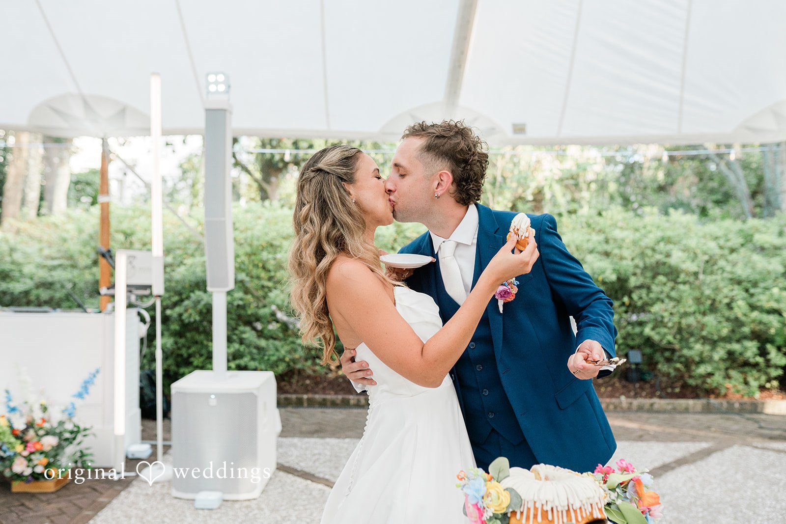 The couple shares a romantic kiss