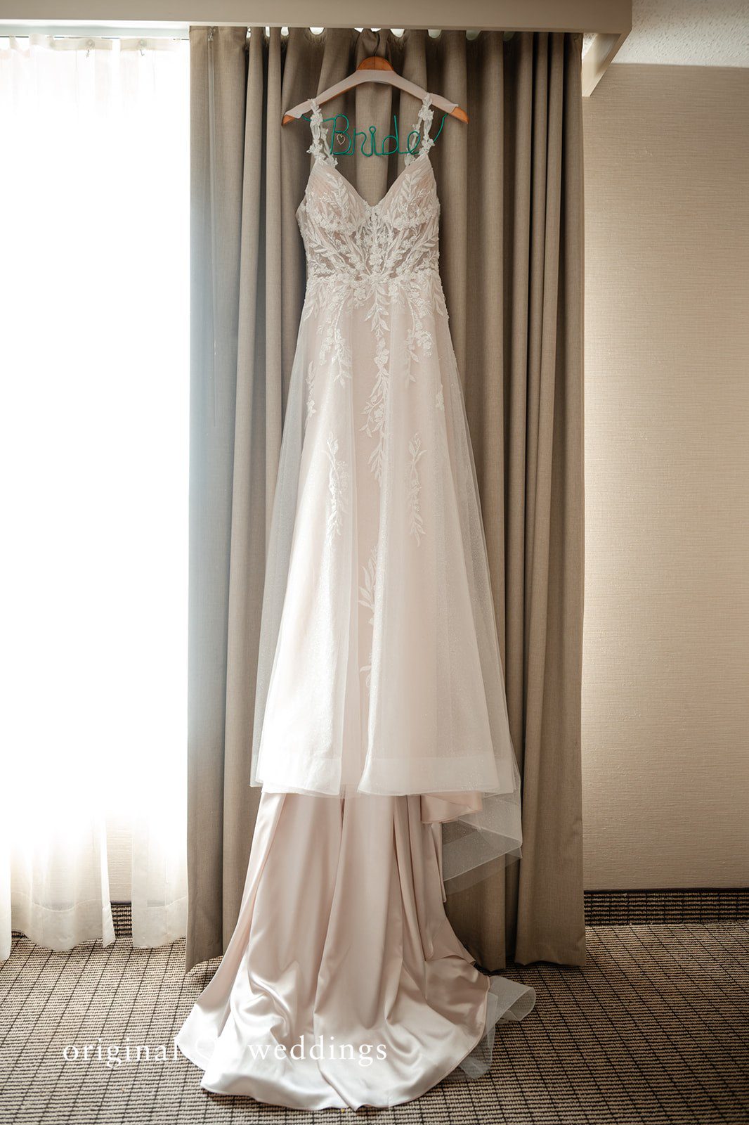 Sara + Austin Beautiful wedding gown of bride captured by team of Original Weddings.