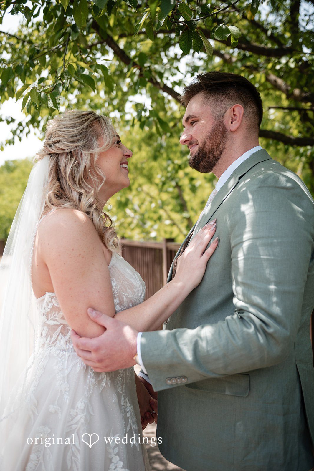Sara + Austin Cleveland wedding photographers from Original Weddings capturing the romantic moment of couple at Great Falls of Tinkers Creek