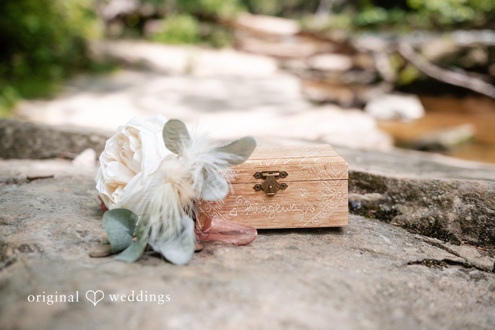 Sara + Austin Beautiful box placed with the white flower.