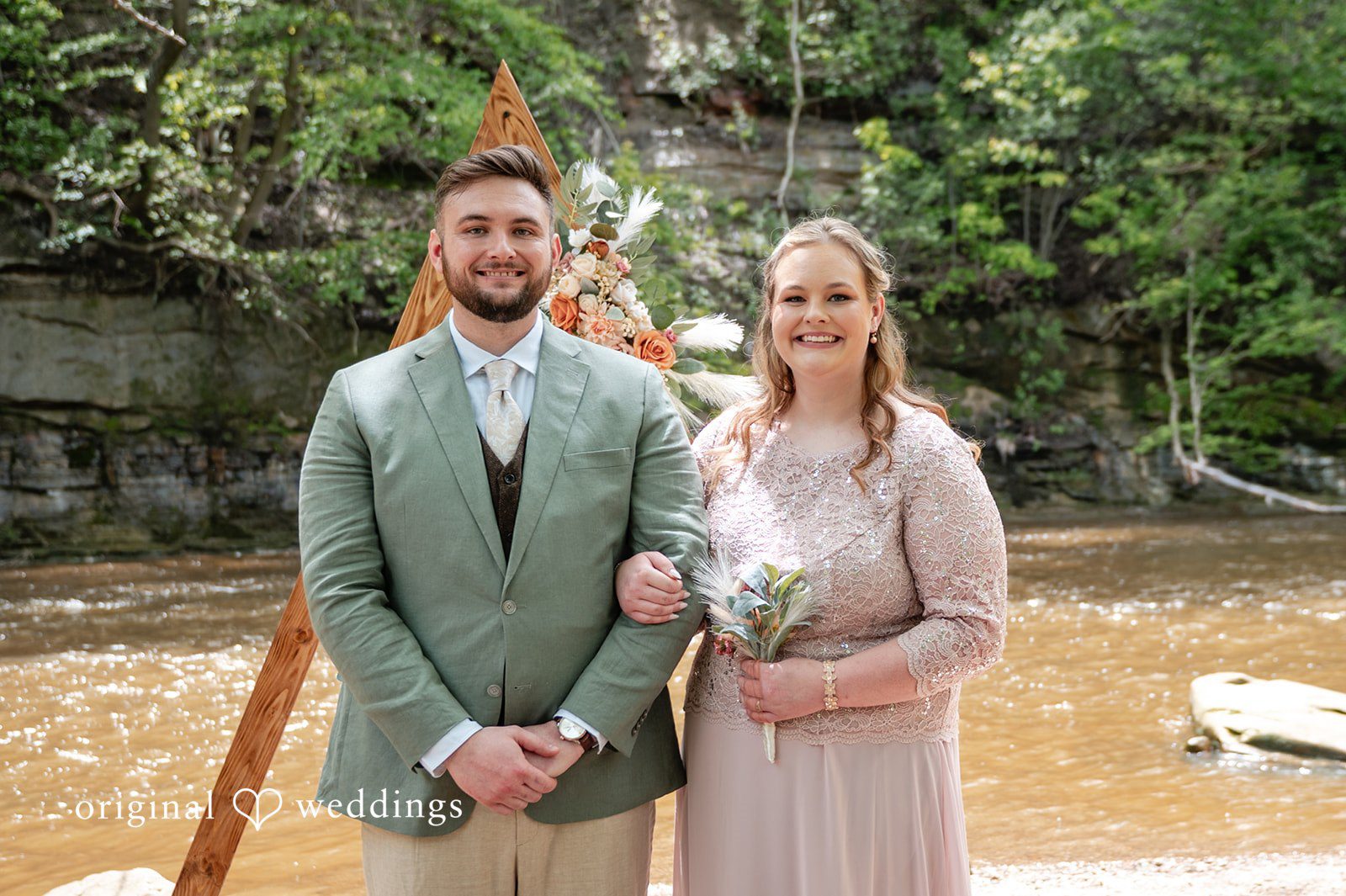 Sara + Austin Beautiful picture of groom at the altar with someone at Great Falls of Tinkers Creek