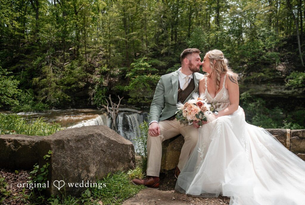 Sara + Austin Cleveland wedding photographers from Original Weddings capturing the romantic moment of couple at Great Falls of Tinkers Creek