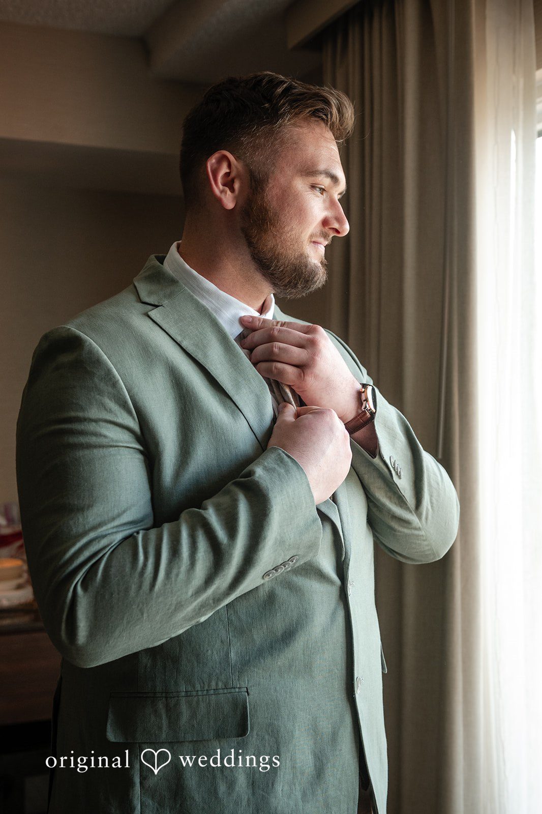 Sara + Austin Elegant portrait of groom while getting ready.