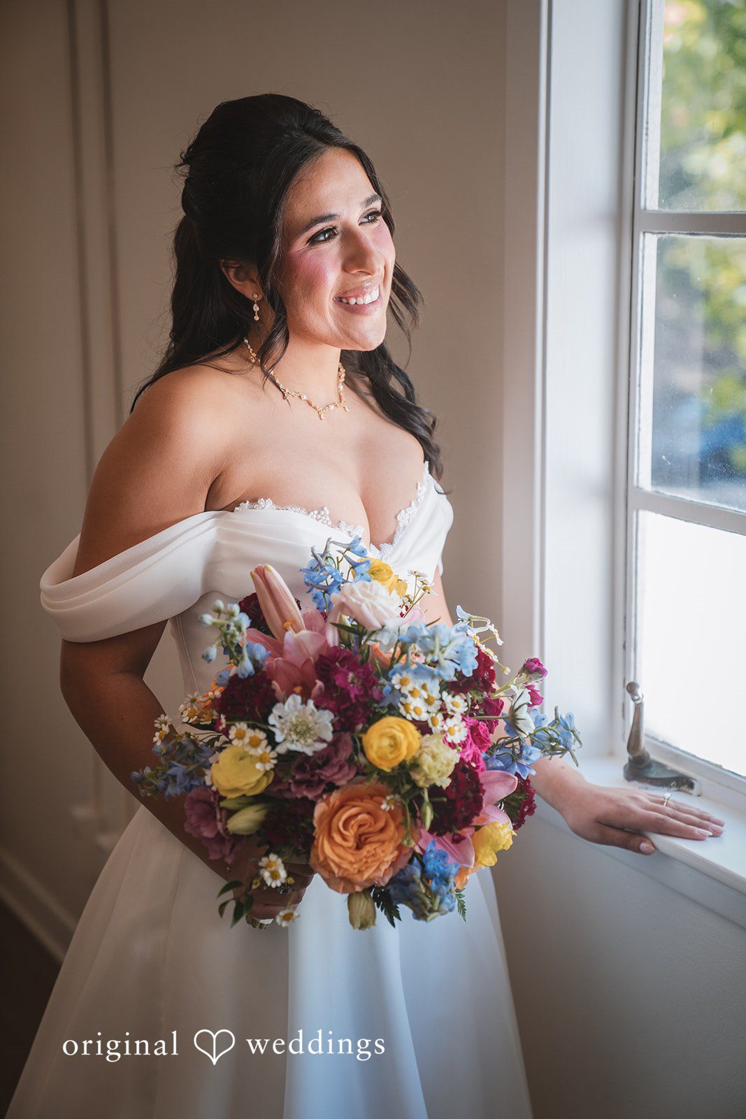 Raena + Austin Our San Francisco wedding photographers captured a stunning portrait of the bride at the suite