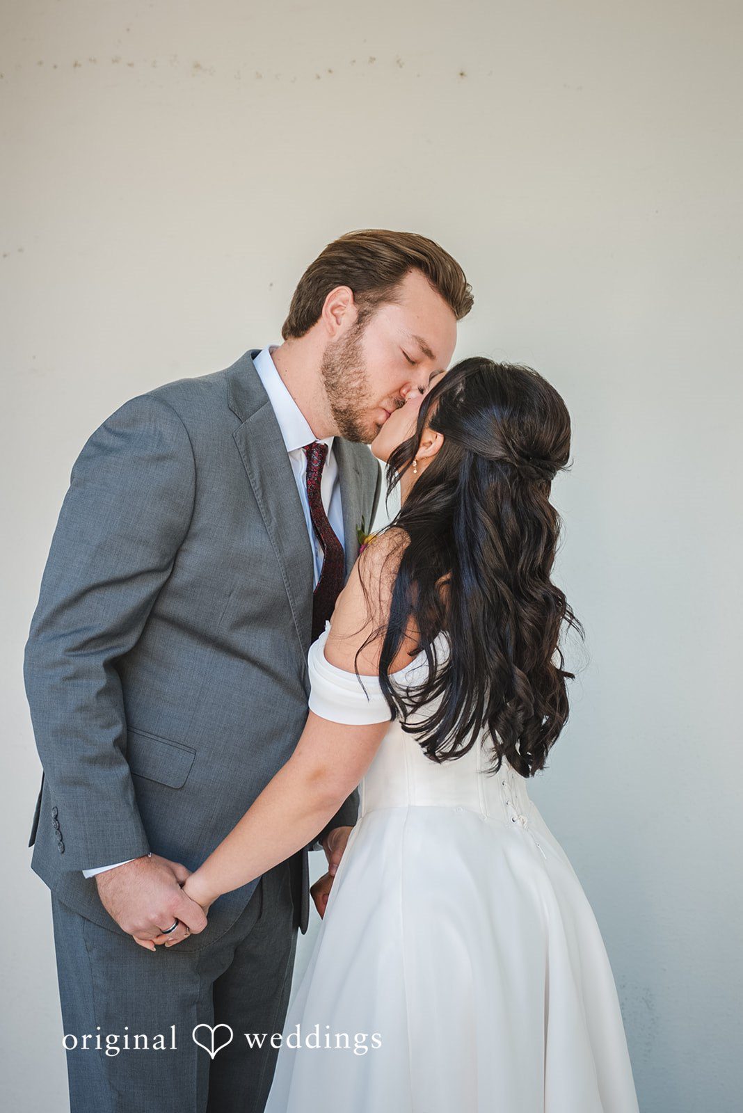 Raena + Austin The couple shares a romantic kiss
