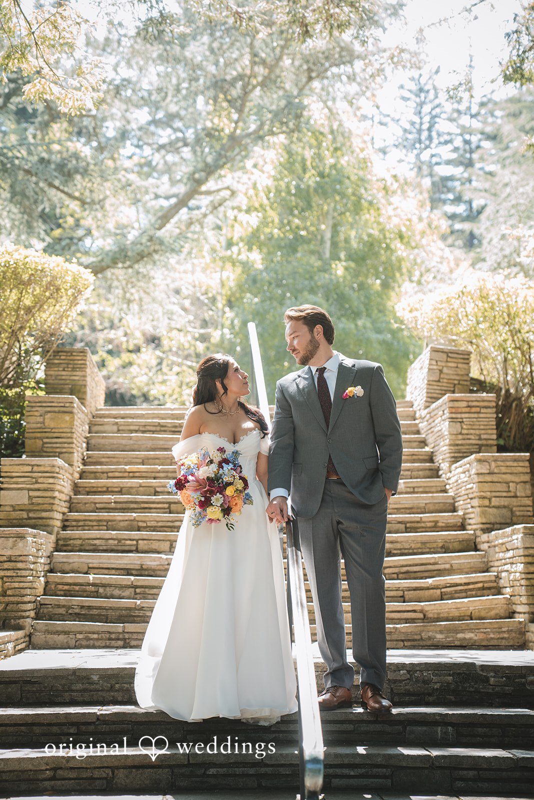 Raena + Austin The couple by the stone stairs