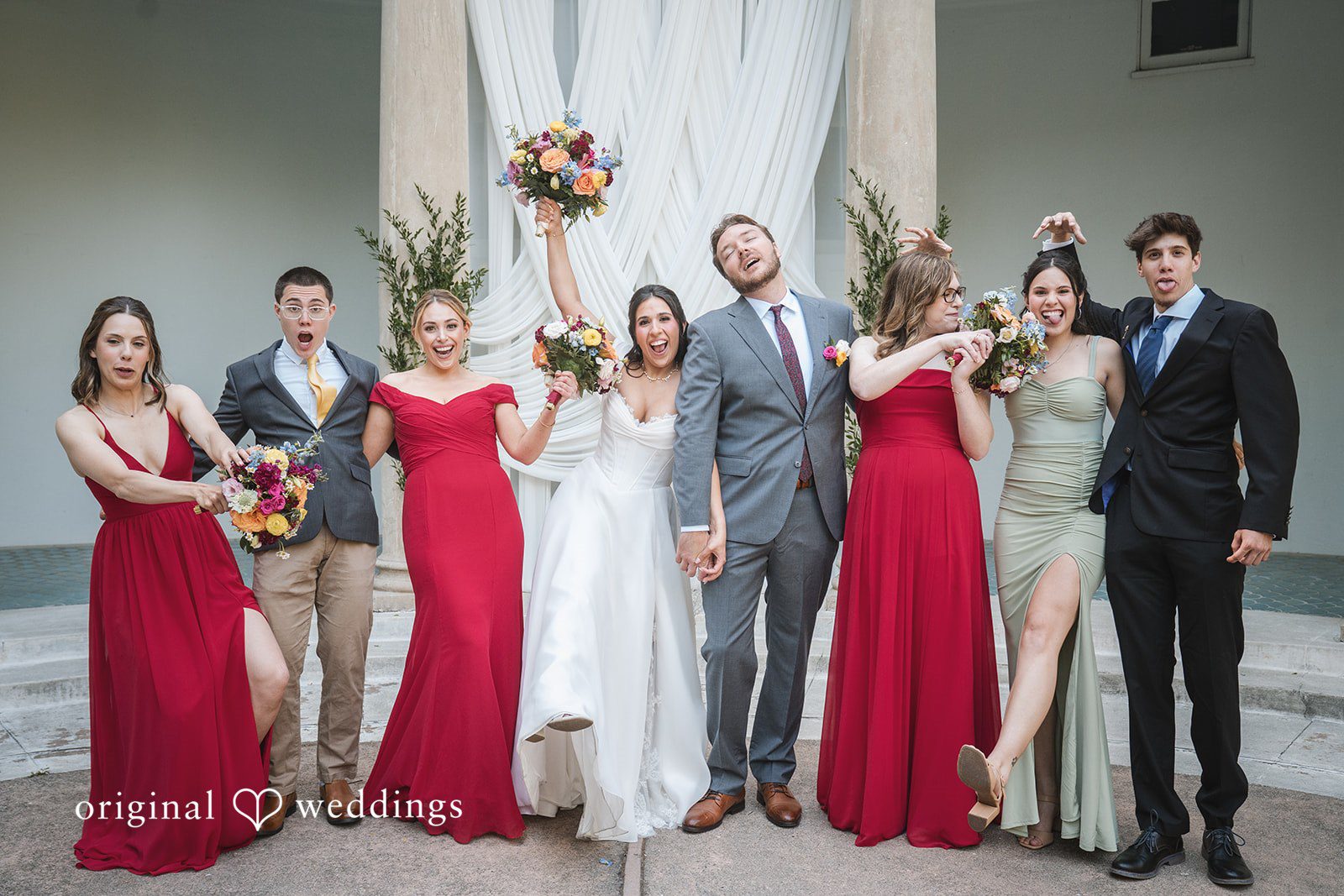 Raena + Austin A joyful portrait of the couple and their bridal party