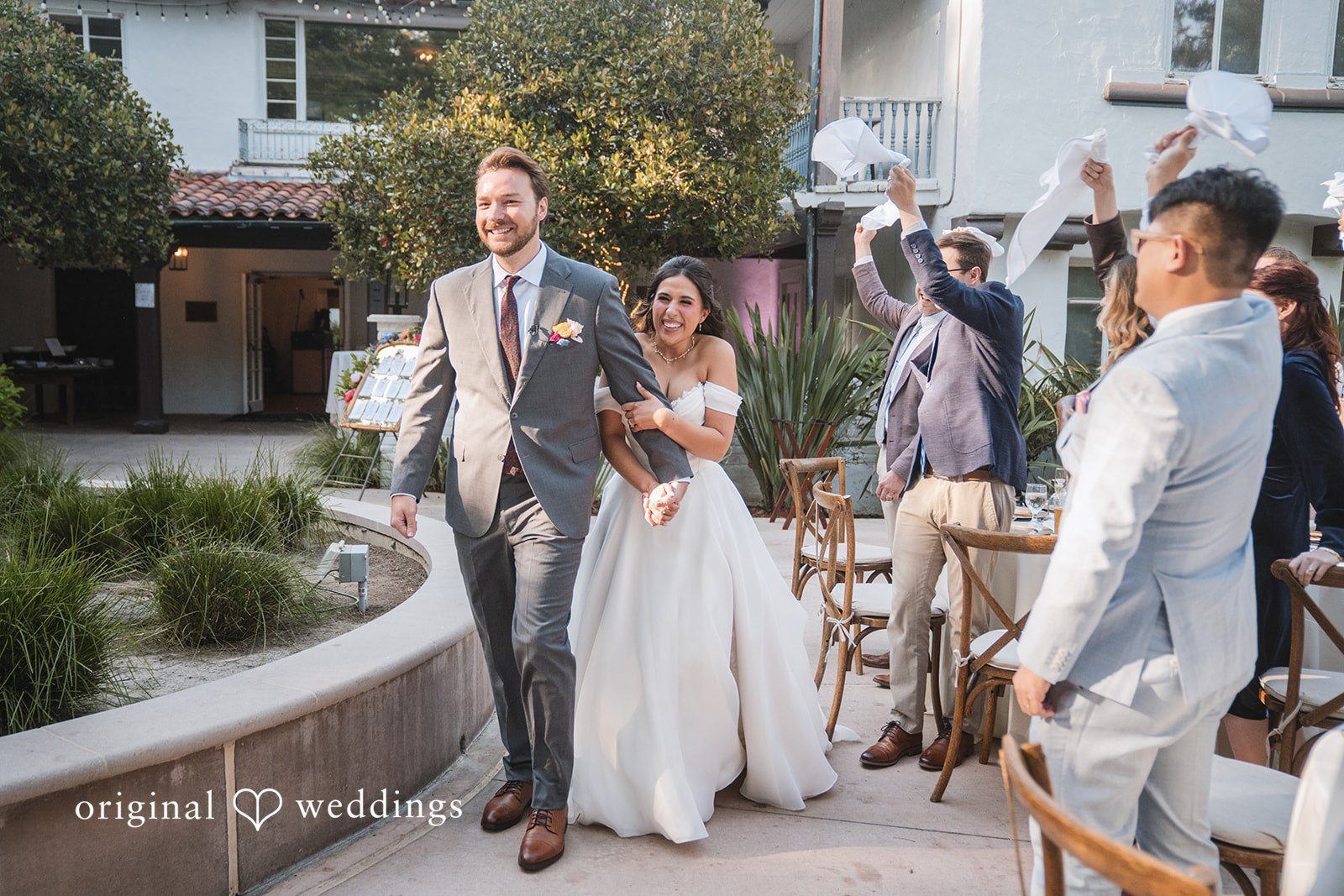 Raena + Austin The couple makes an entrance to their wedding reception