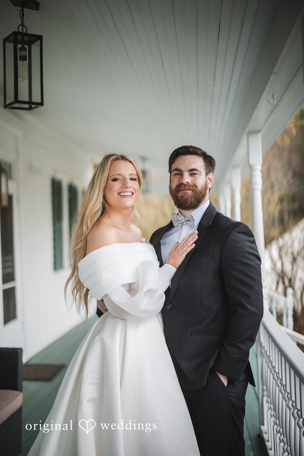 Shea + Peter A portrait of the couple by the balcony