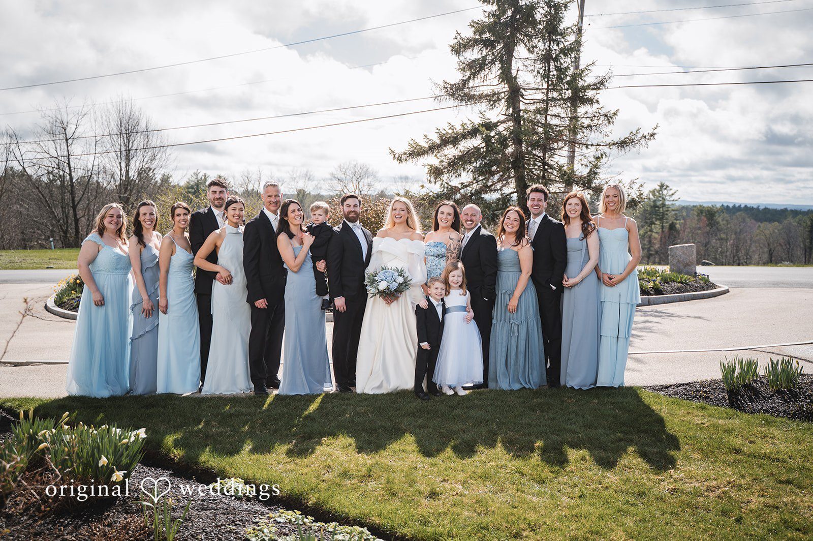 Our Boston wedding photographers at Original Weddings captured a beautiful portrait of the couple and their bridal party at Harrington Farm