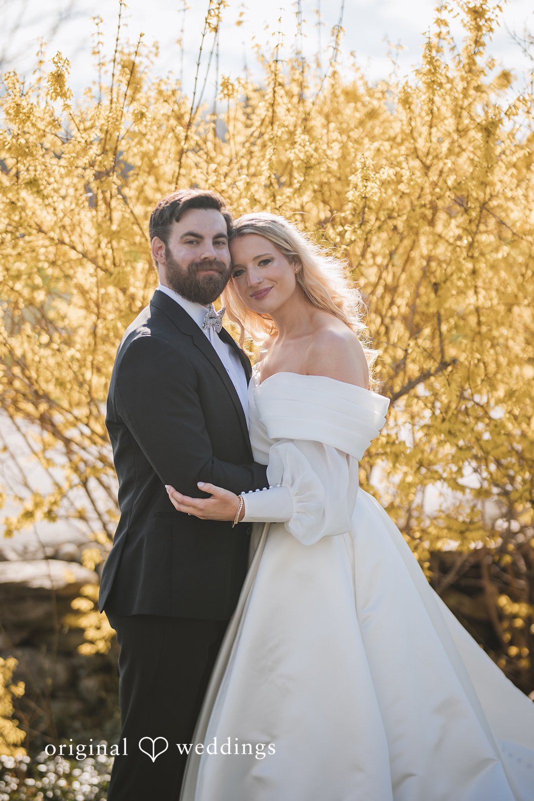 Shea + Peter A stunning portrait of the couple by the field