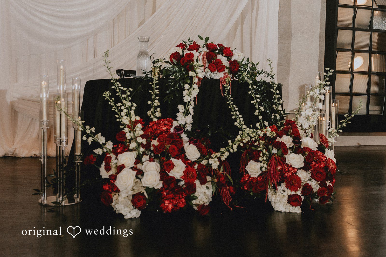 Christina + Josue Table decorated with huge flowers and other details