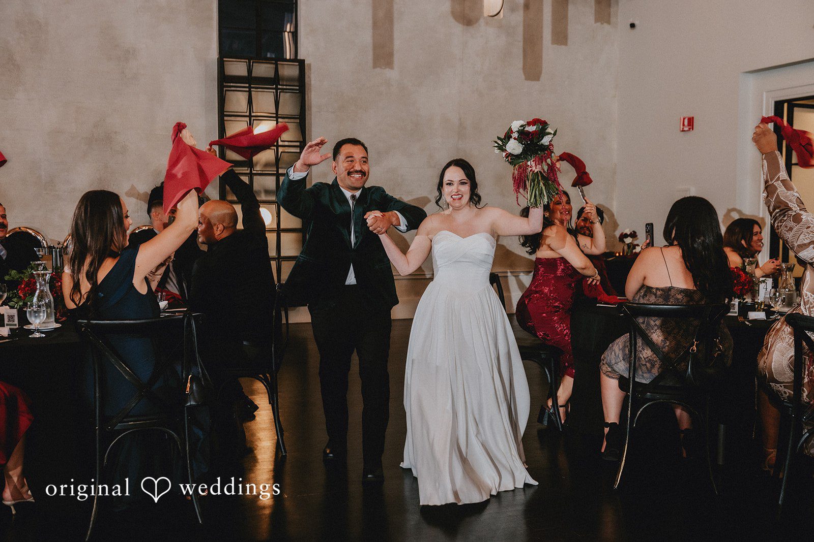 Christina + Josue The couple makes a joyful entrance to their wedding reception