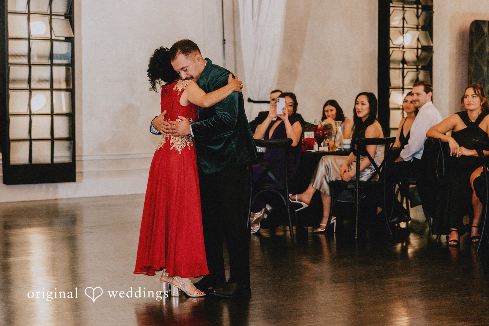Christina + Josue The groom and his mother shares a passionate hug