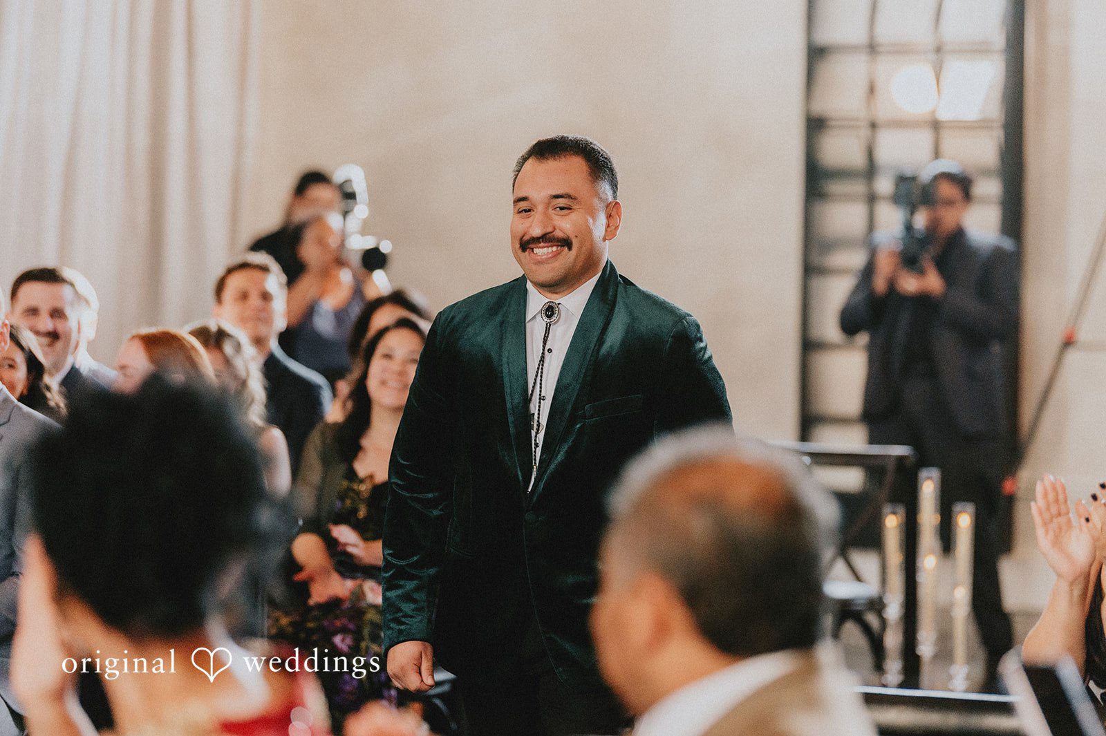 Christina + Josue The groom walks down the aisle