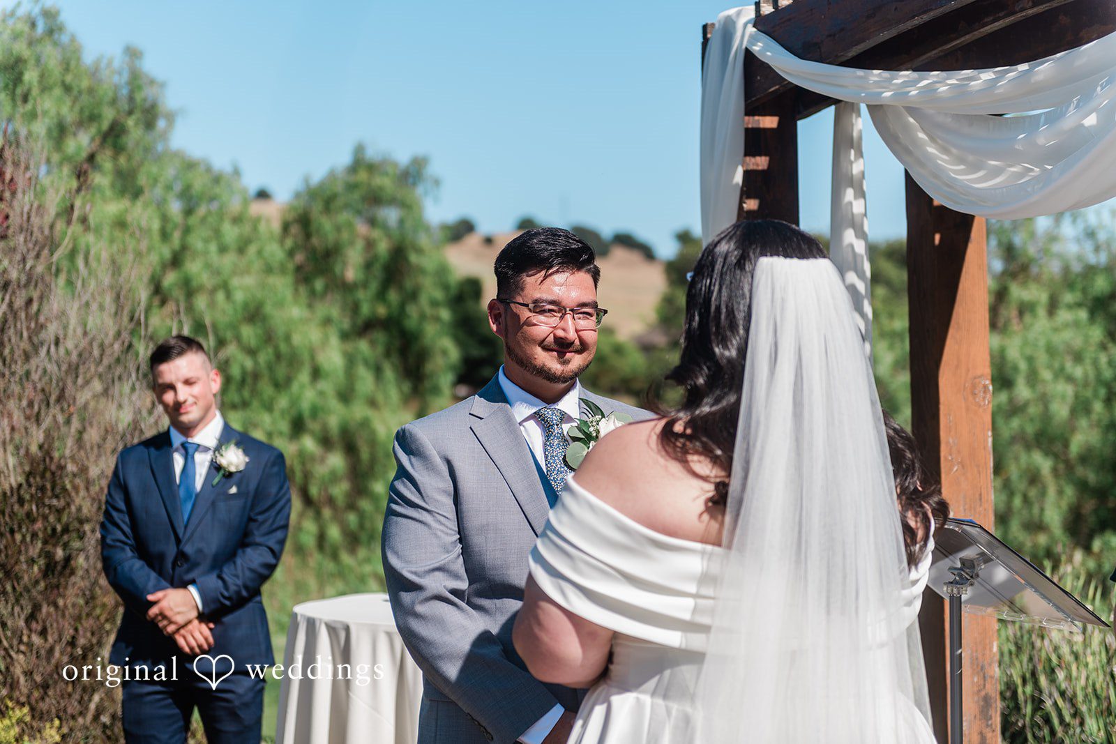 Groom looking at the bride with smile and love