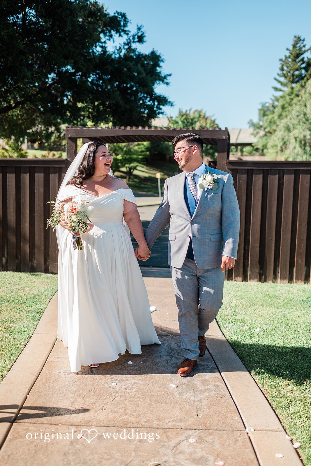 Couple walking and looking at each other