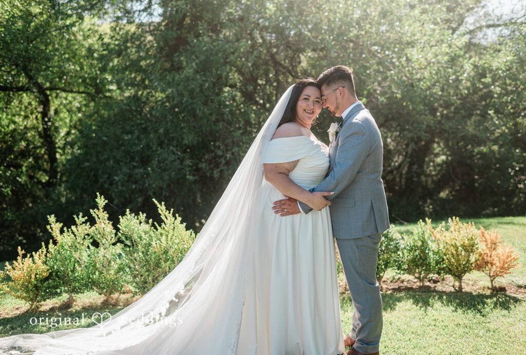 Romantic pose of couple at Hiddenbrooke Hills captured by San Francisco Wedding Photographers from Original Weddings