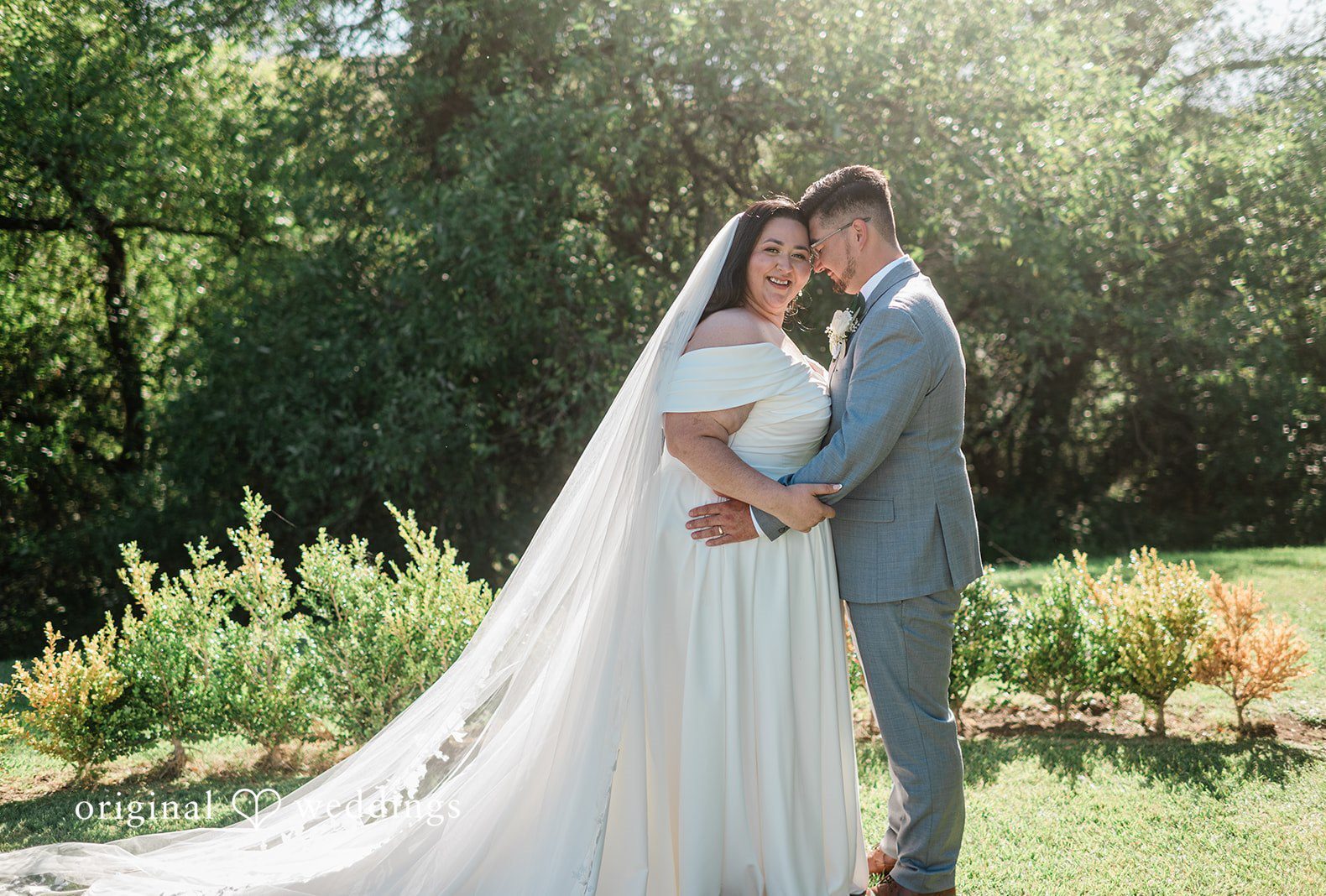 Romantic pose of couple at Hiddenbrooke Hills captured by San Francisco Wedding Photographers from Original Weddings