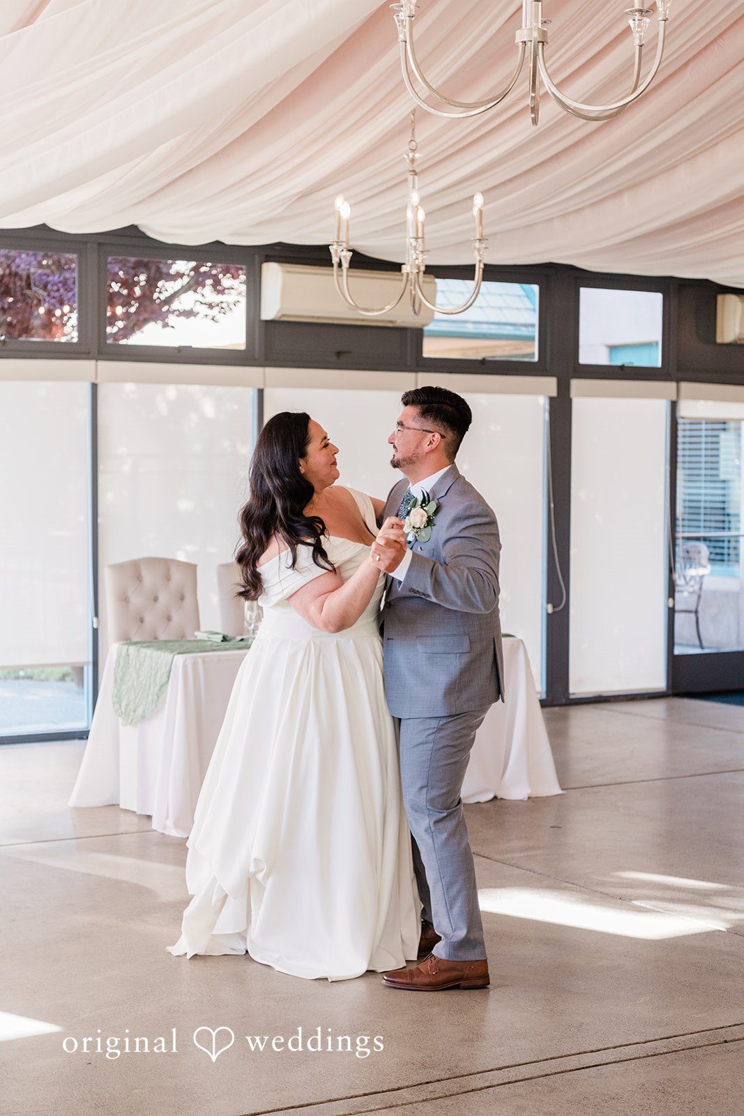 Couple sharing a romantic dance at wedding reception