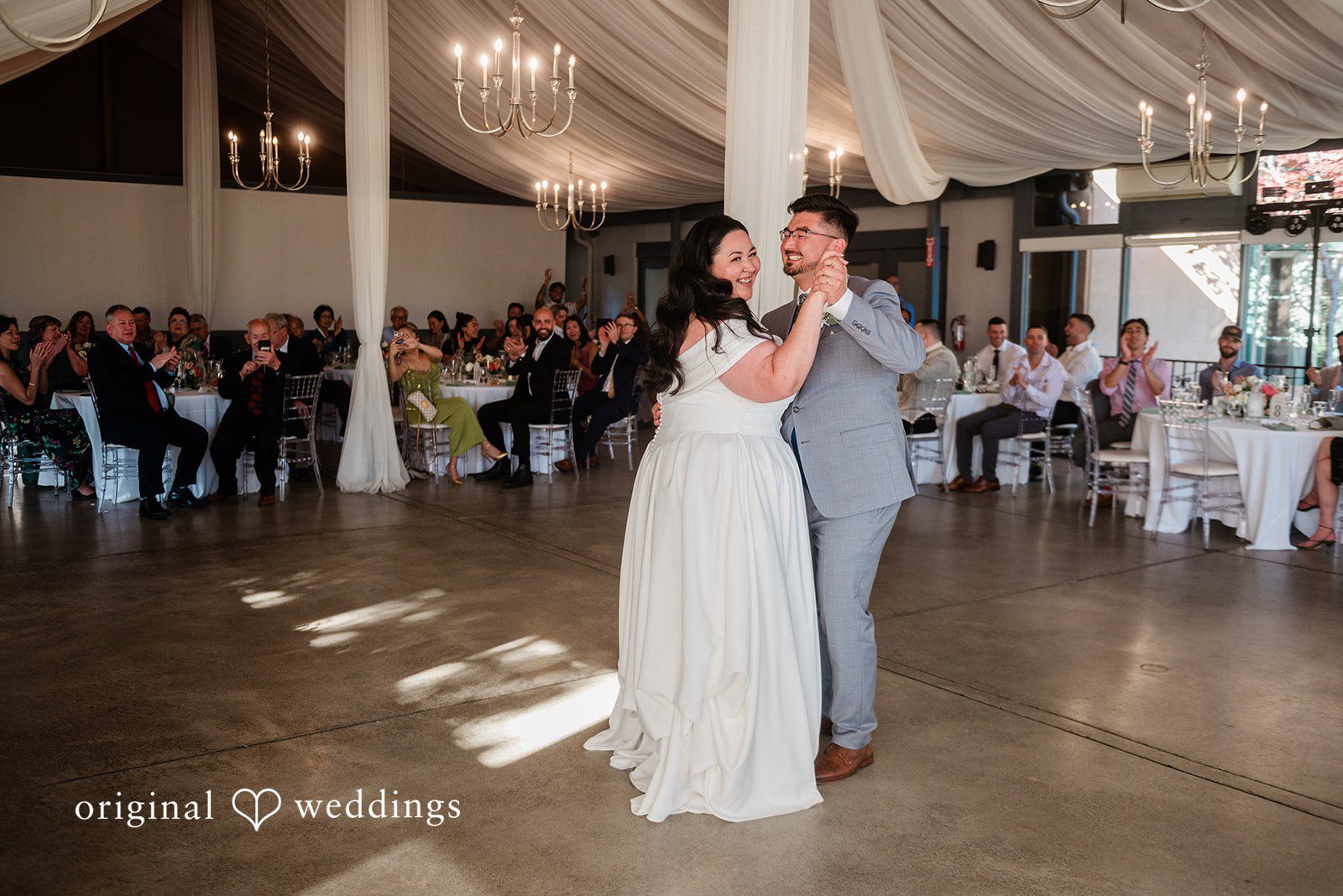 Couple sharing a romantic dance at wedding reception