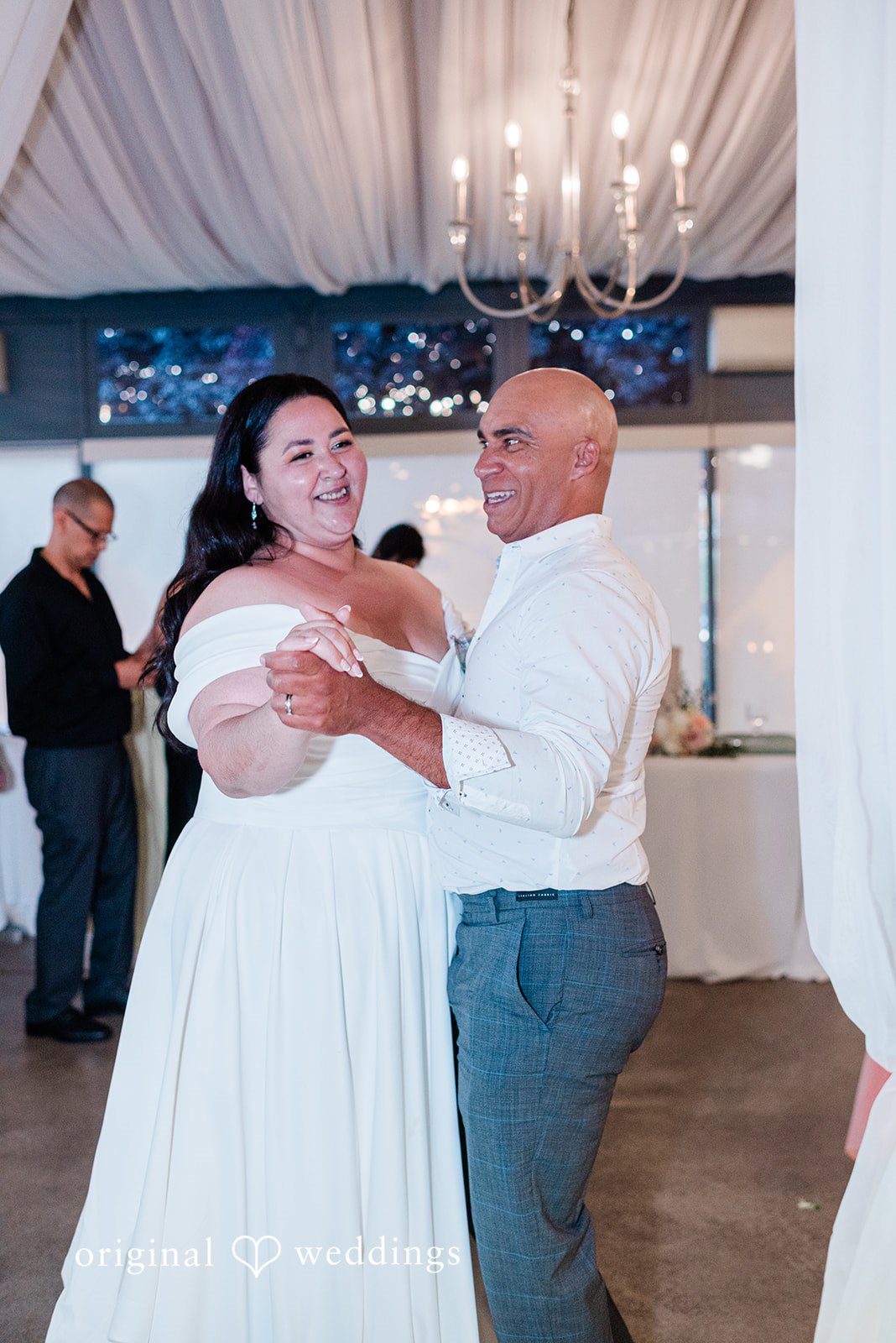 Bride sharing a dance with a man
