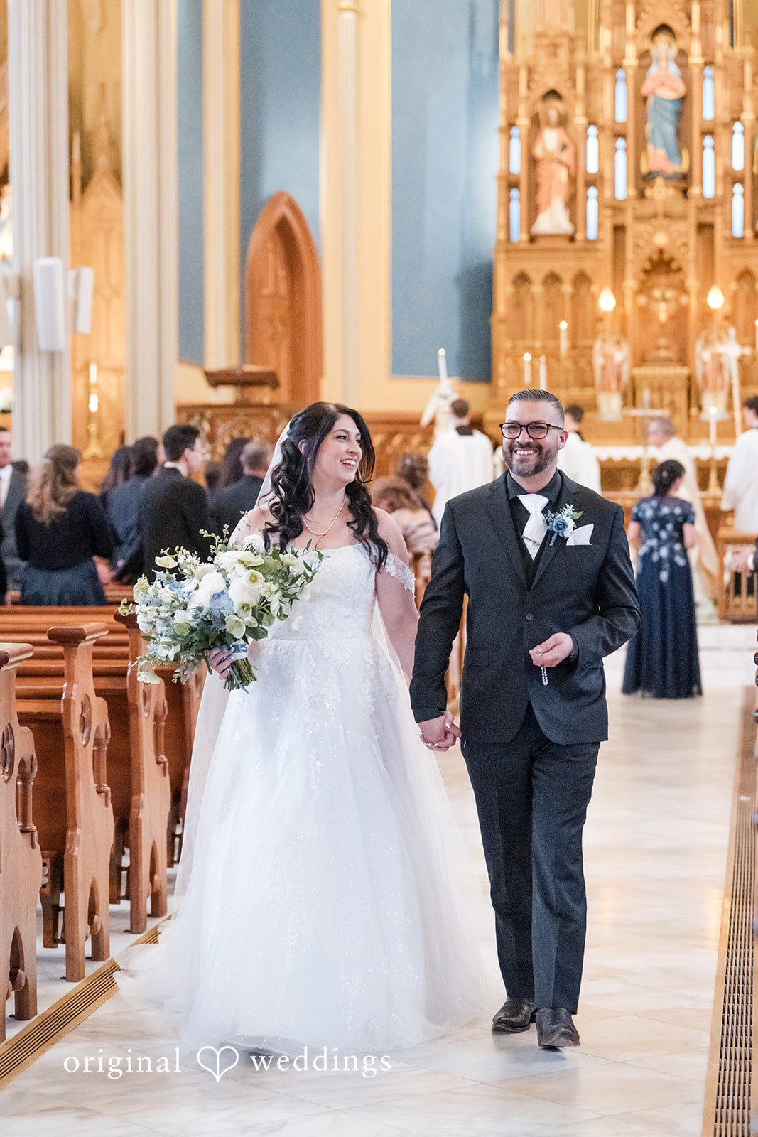 Peter + Aimee Elegant bride and groom walking portrait while holding hands at Hilton Portland Downtown
