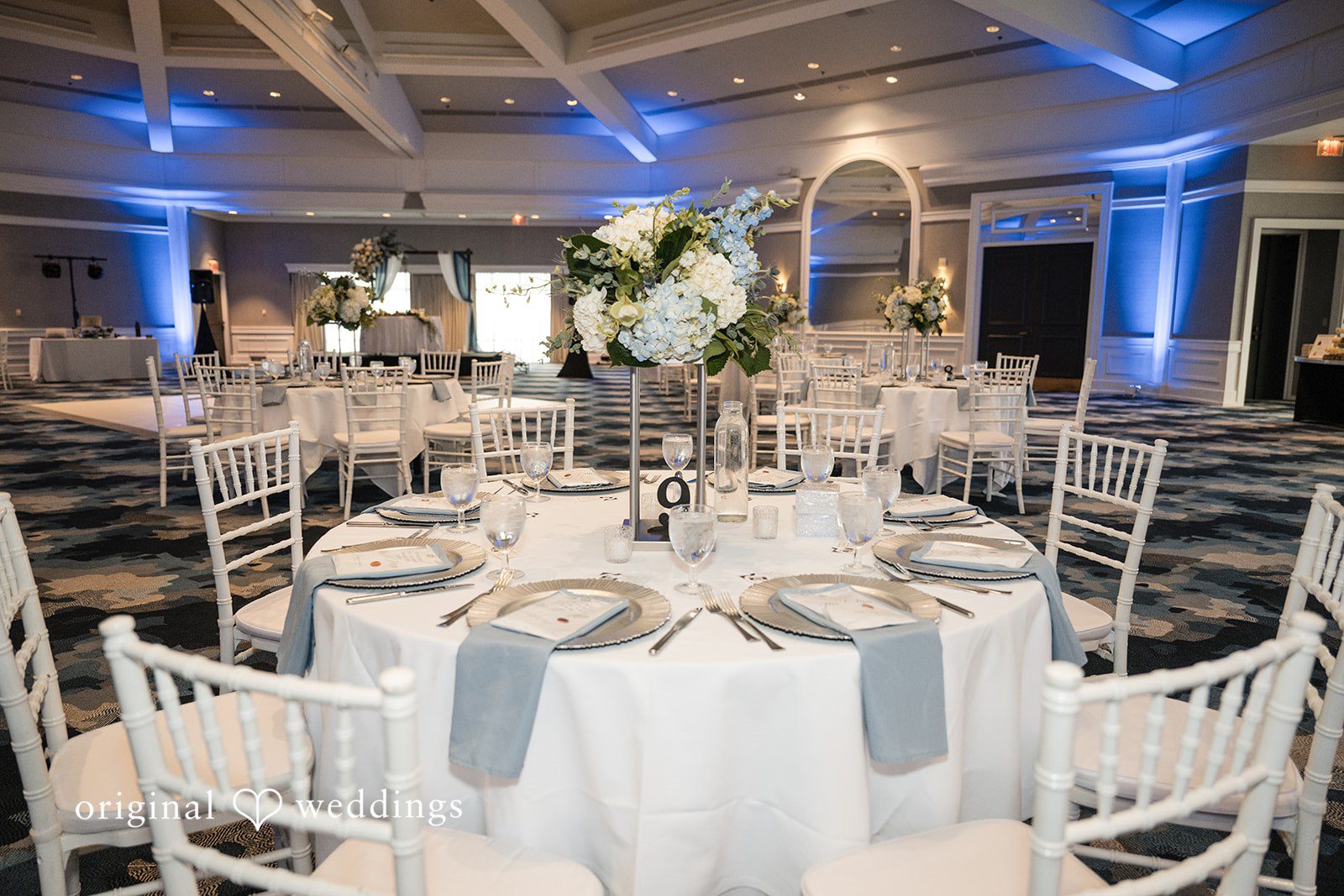 Peter + Aimee Elegant wedding table styling with center flowers at Hilton Portland Downtown