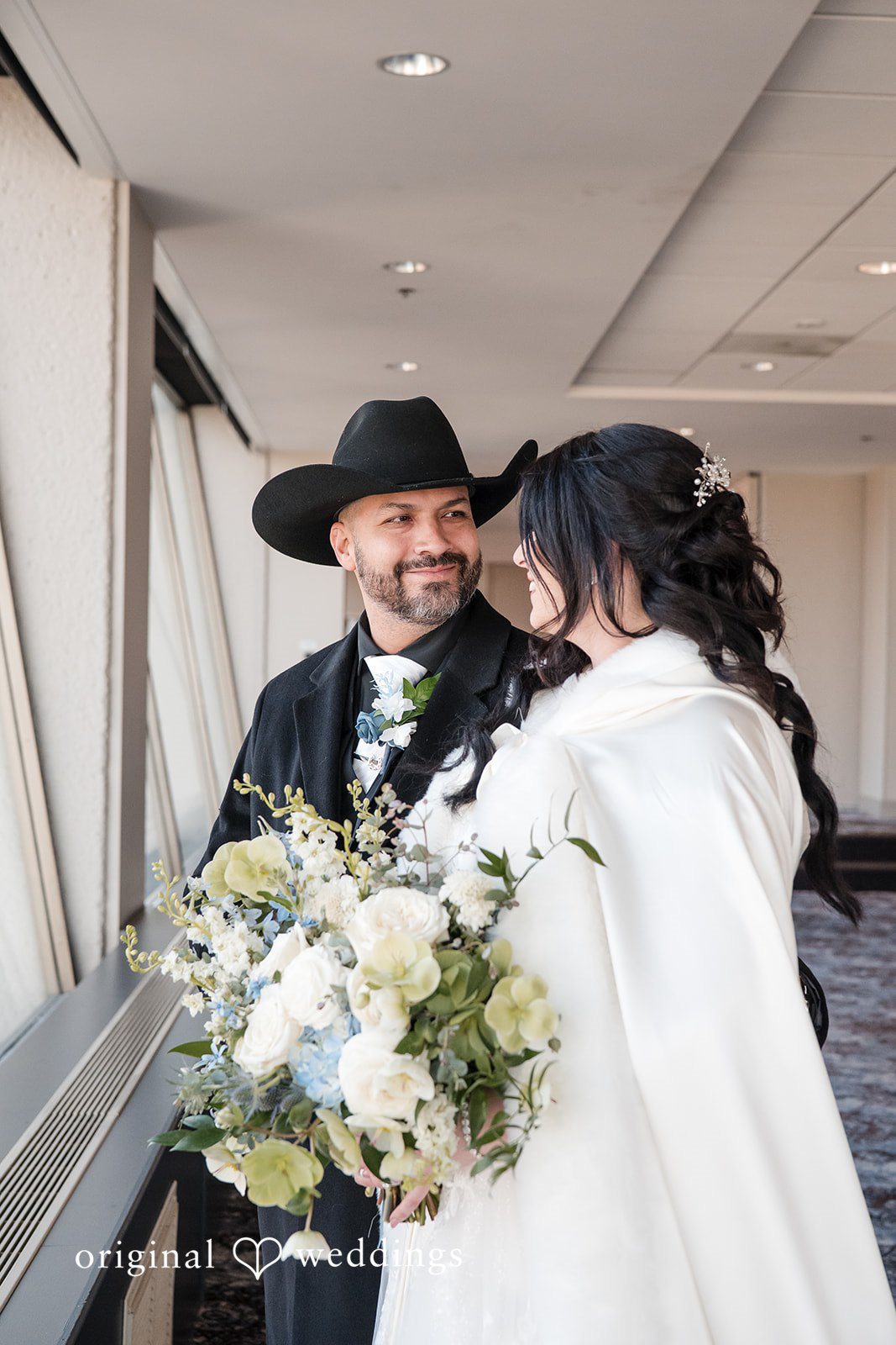 Peter + Aimee Romantic bride and groom portrait with flowers at Hilton Portland Downtown