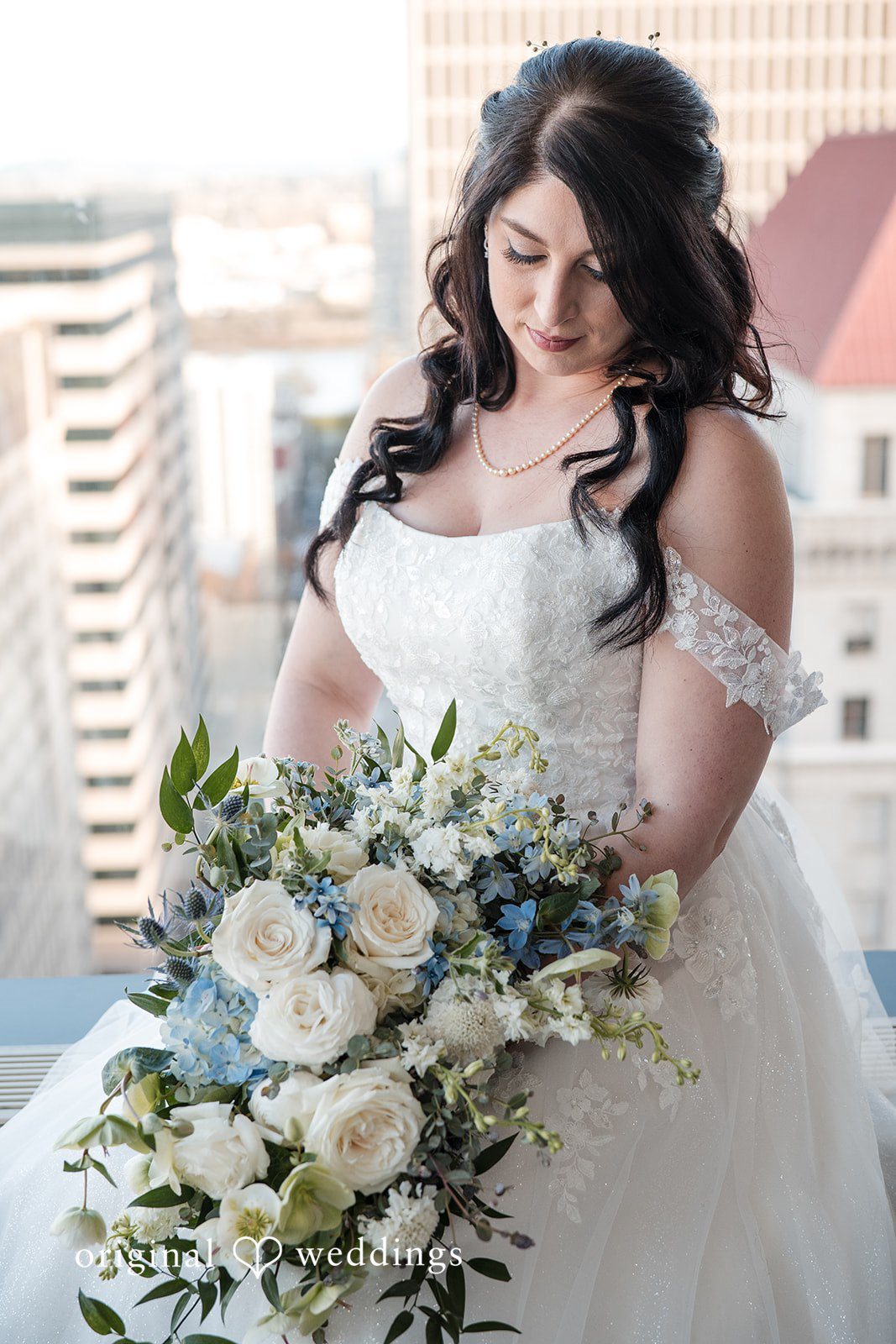Peter + Aimee Romantic bridal portrait with bouquet at Hilton Portland Downtown