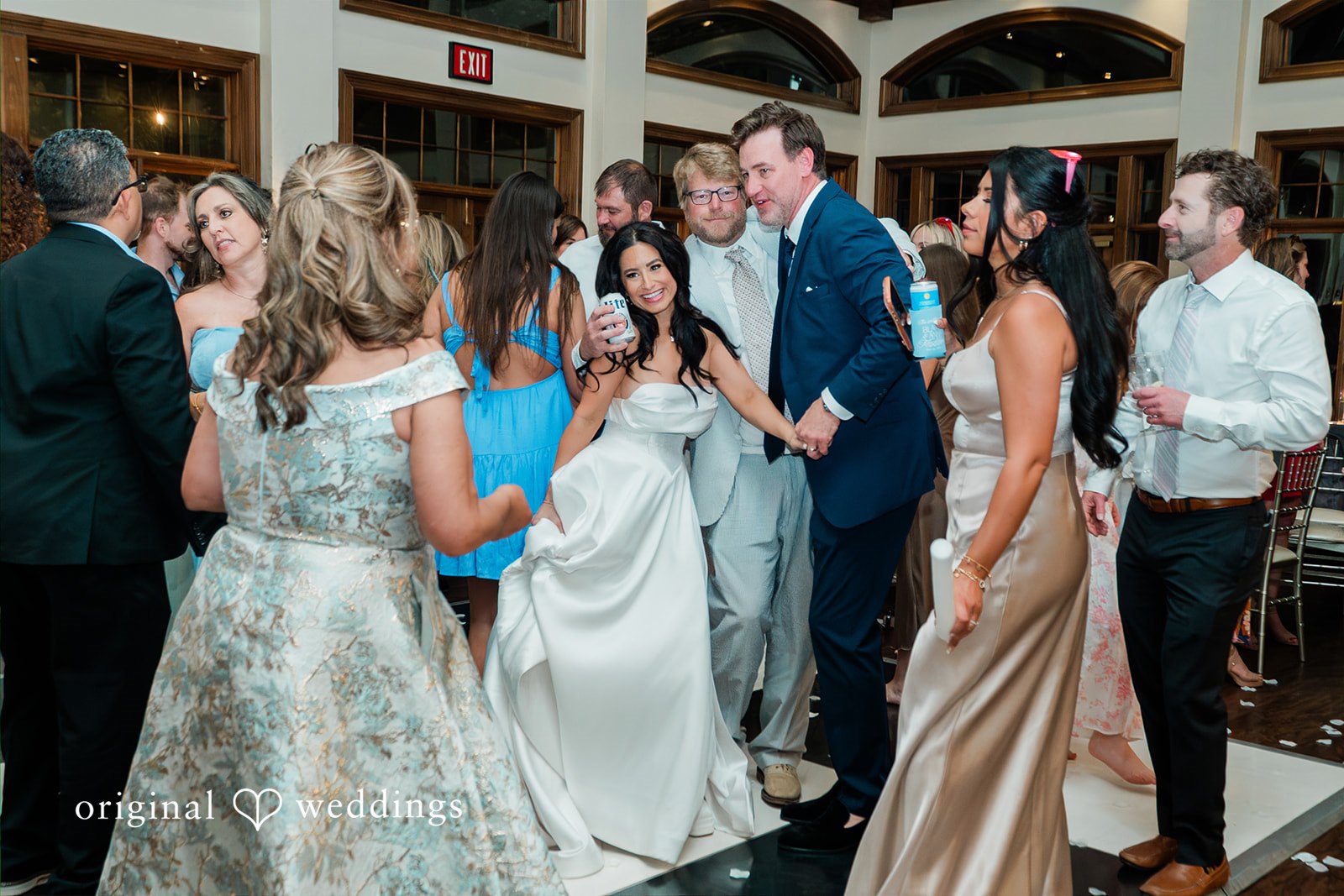 Anna + Blake Couple enjoying their wedding reception with family and friends