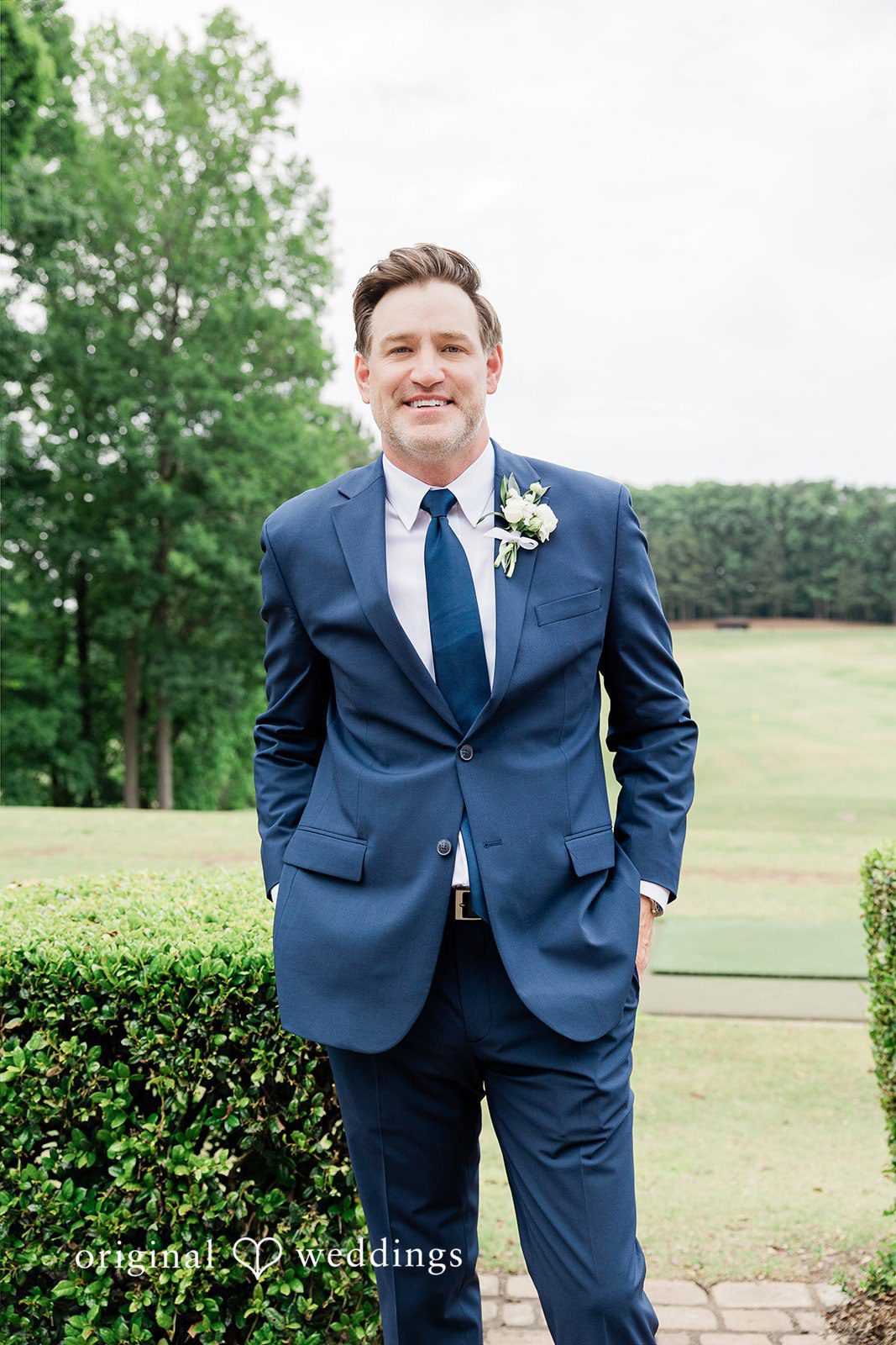 Anna + Blake Elegant portrait of groom in his wedding attire at Iron Horse Golf Club