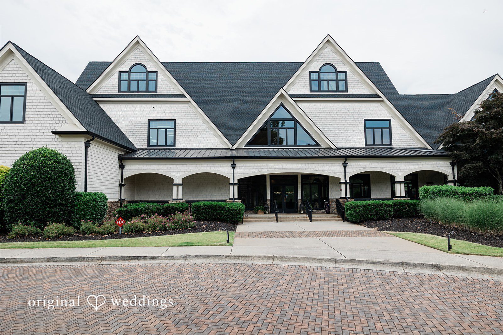 Anna + Blake Charming outer view of Iron Horse Golf Club