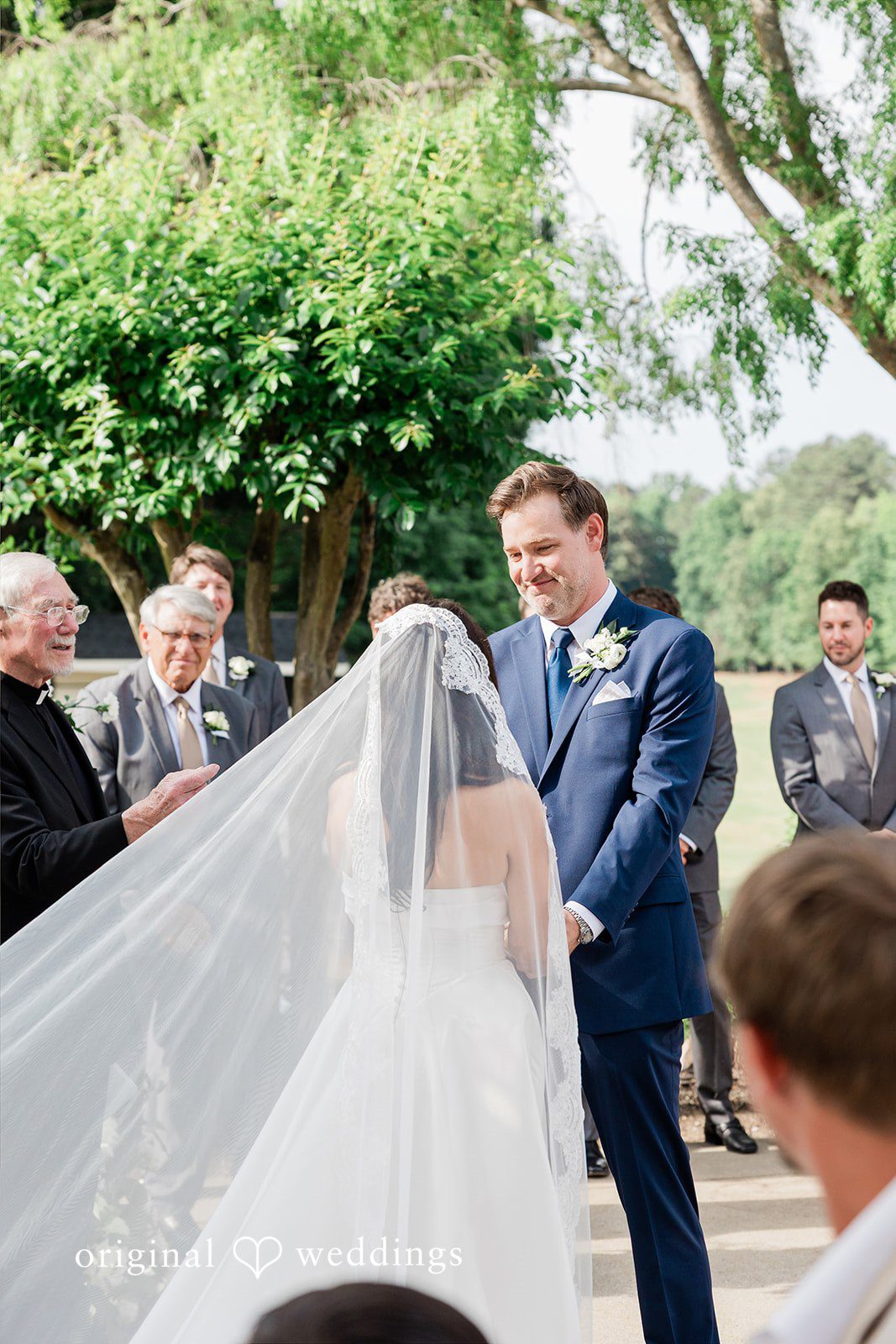 Anna + Blake Groom receiving the bride at the altar