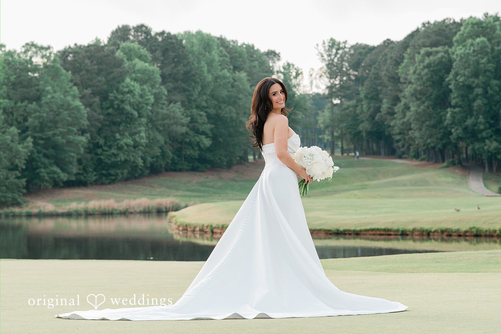 Anna + Blake Solo photoshoot of bride at Iron Horse Golf Club posing with bouquet in her hands