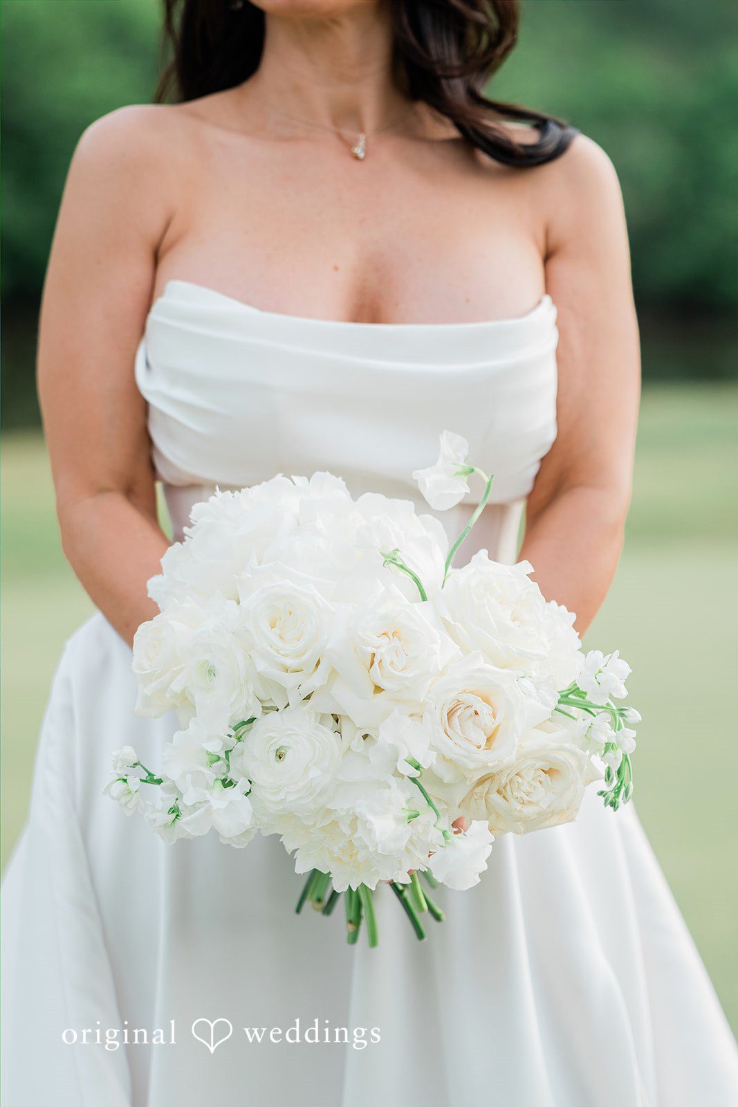 Anna + Blake A shot of bride holding bouquet at Iron Horse Golf Club