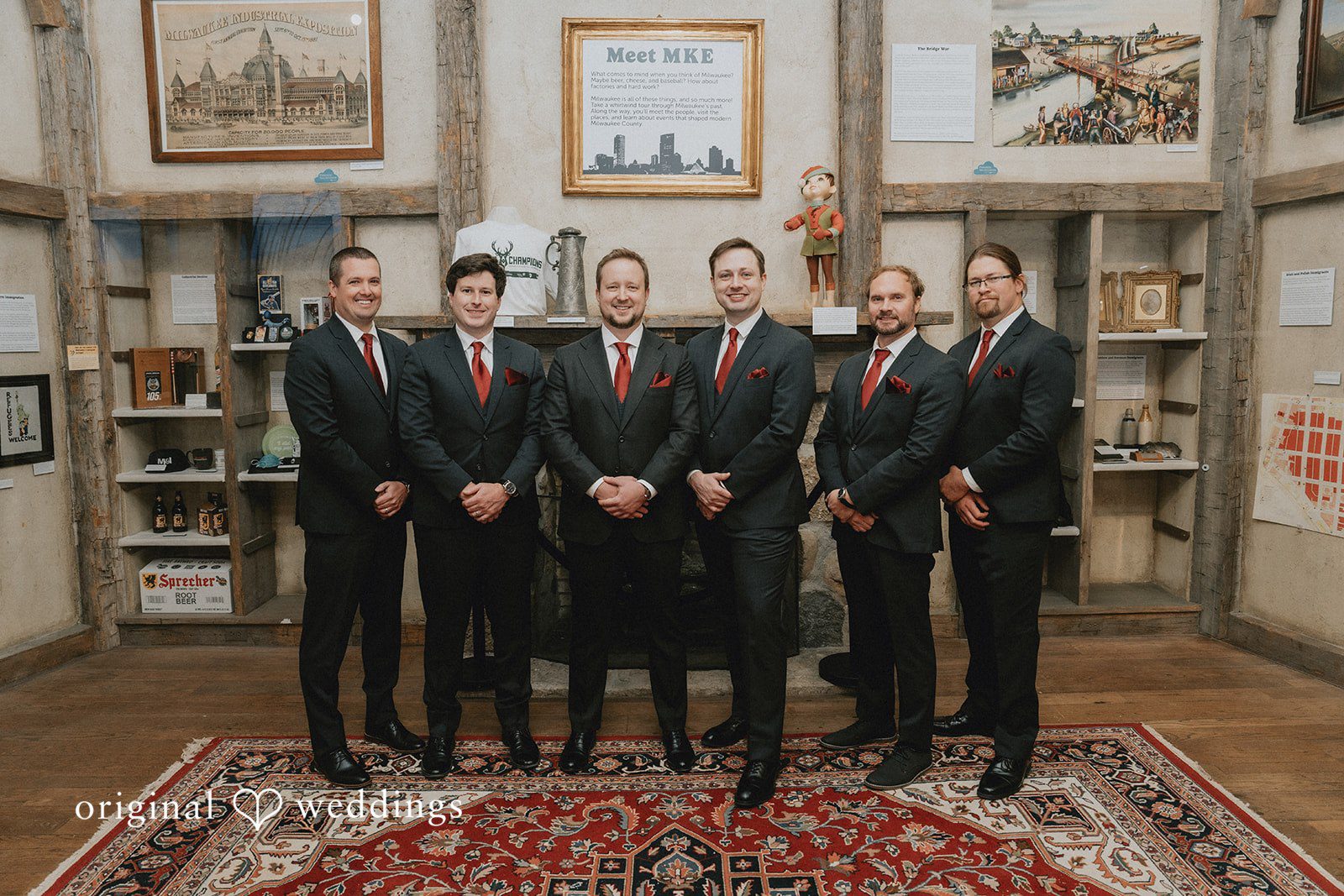 Spencer + Hilary A stunning portrait of the groom and his groomsmen at the suite