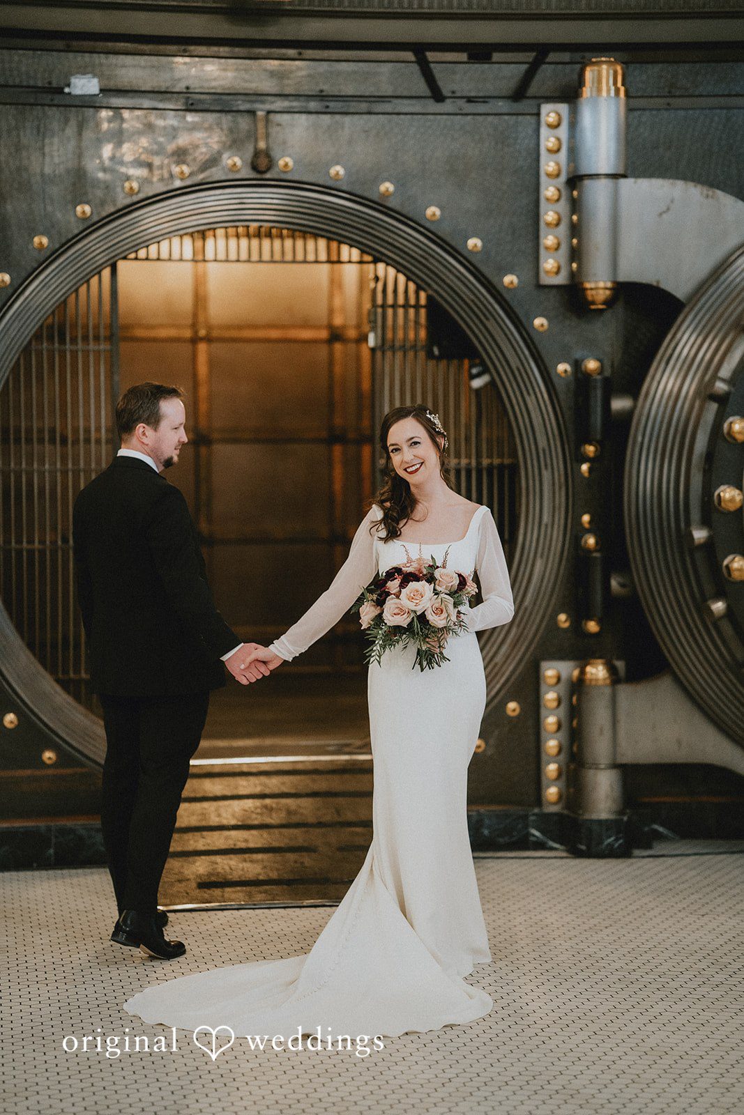 Spencer + Hilary A portrait of the couple framed by the architectural beauty of the Jan Serr Studio