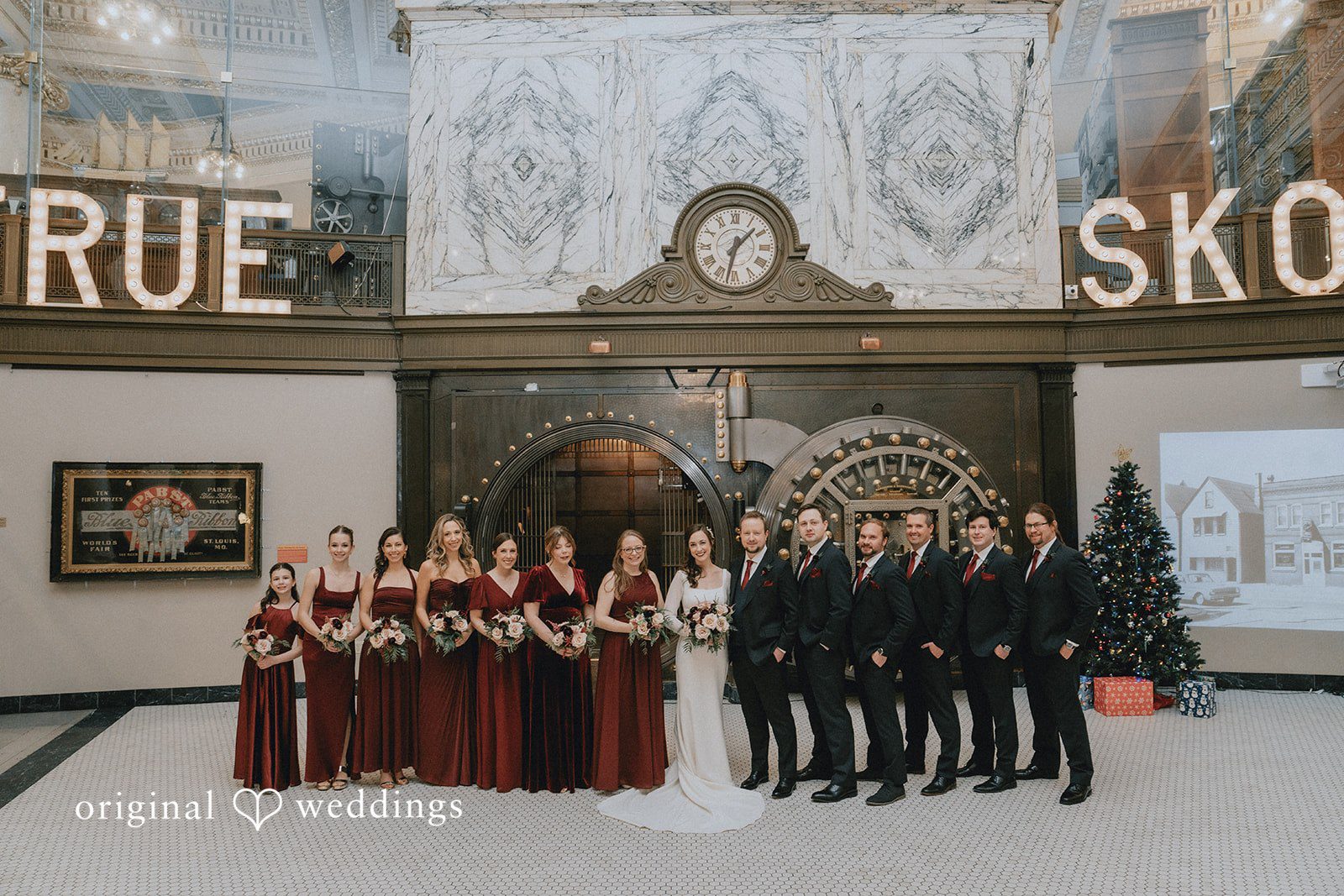 Spencer + Hilary A portrait of the couple and their bridal party at Jan Serr Studio