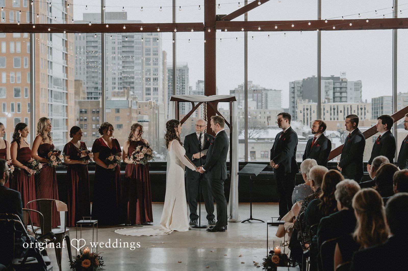 Our Milwaukee wedding photographers at Original Weddings captured the moment the couple exchanged vows at Jan Serr Studio