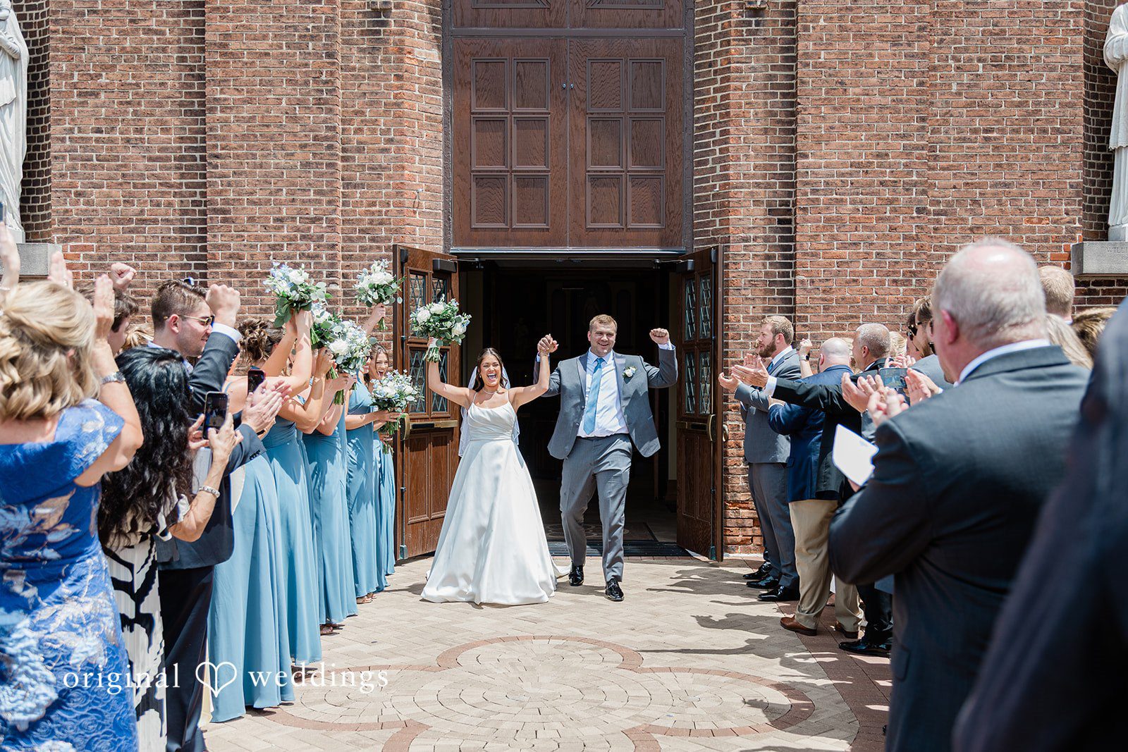 The couple makes a joyful exit after their wedding ceremony